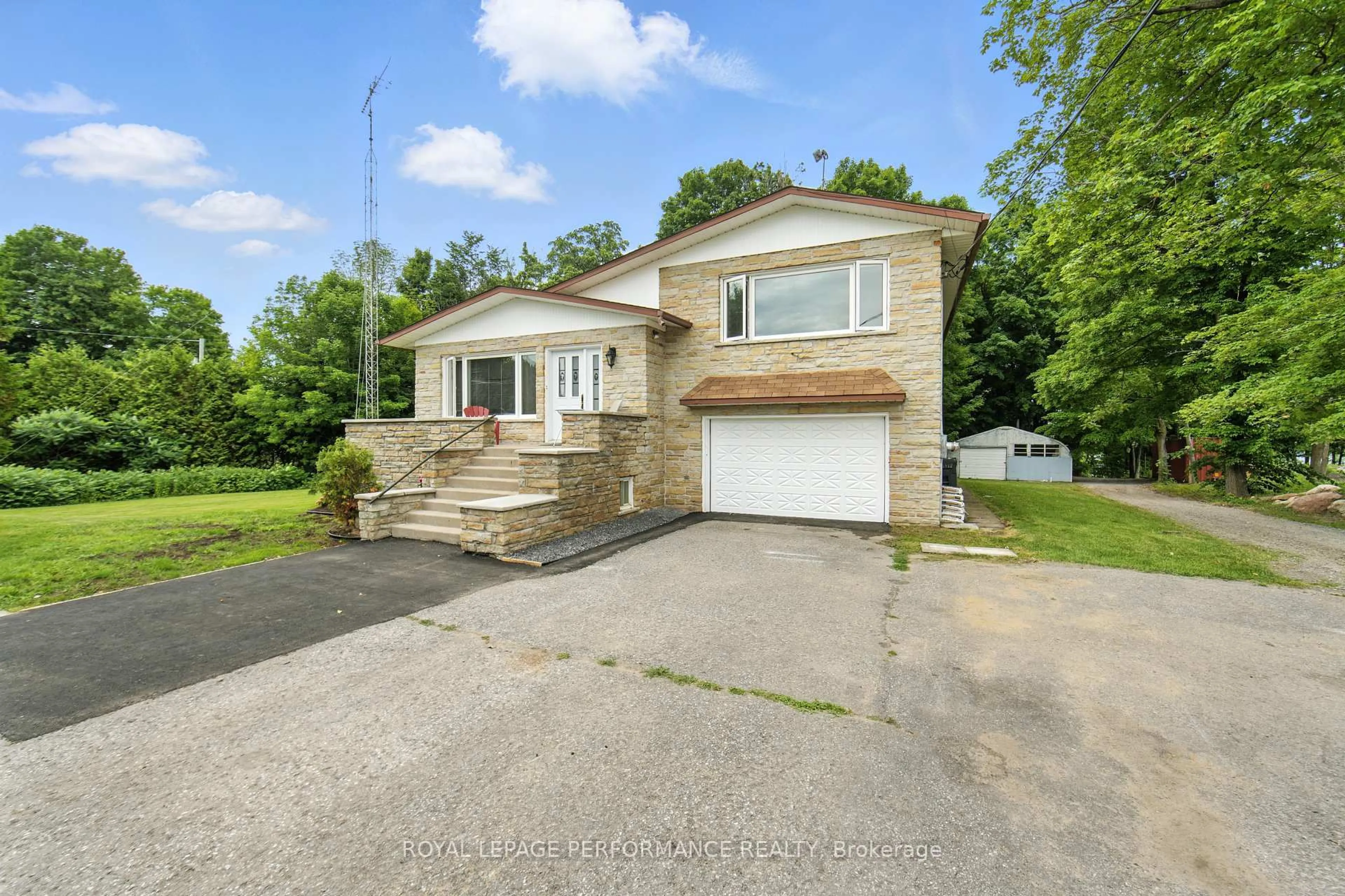 A pic from outside/outdoor area/front of a property/back of a property/a pic from drone, street for 2505 Front Rd, East Hawkesbury Ontario K6A 2R2