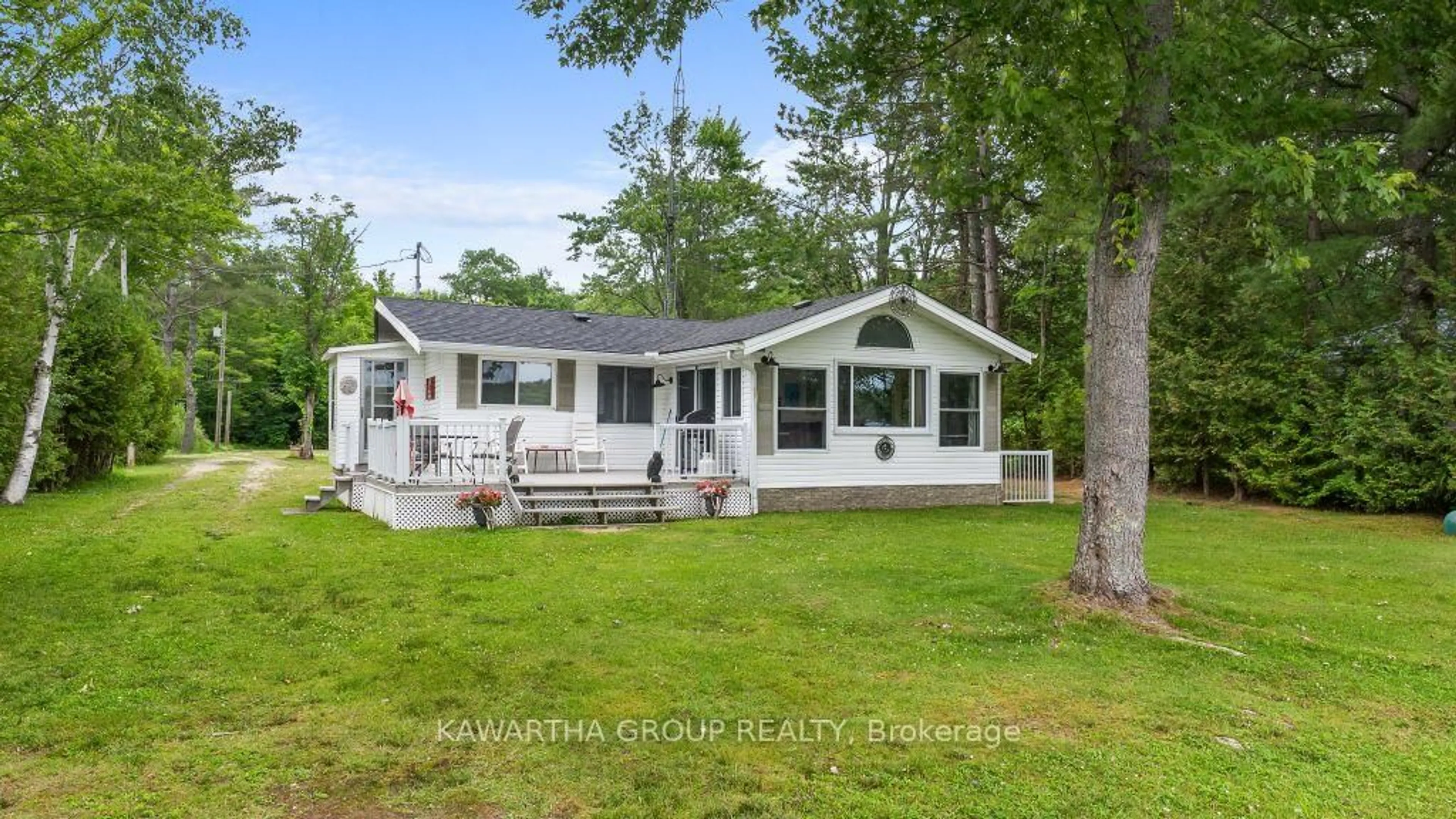 Home with vinyl exterior material, water/lake/river/ocean view for 212 North Shore Rd, Kawartha Lakes Ontario K0M 2B0