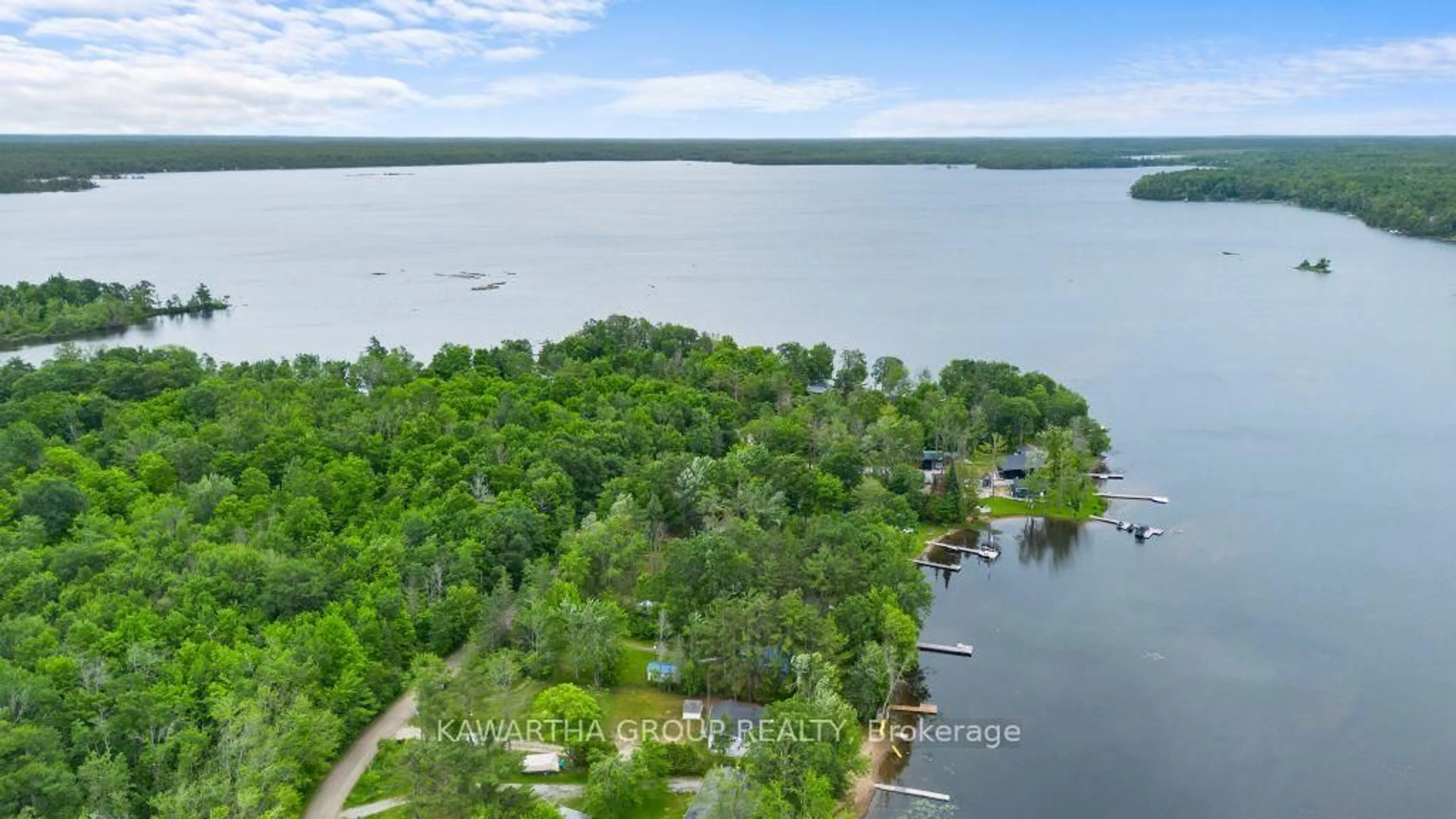 A pic from outside/outdoor area/front of a property/back of a property/a pic from drone, water/lake/river/ocean view for 212 North Shore Rd, Kawartha Lakes Ontario K0M 2B0