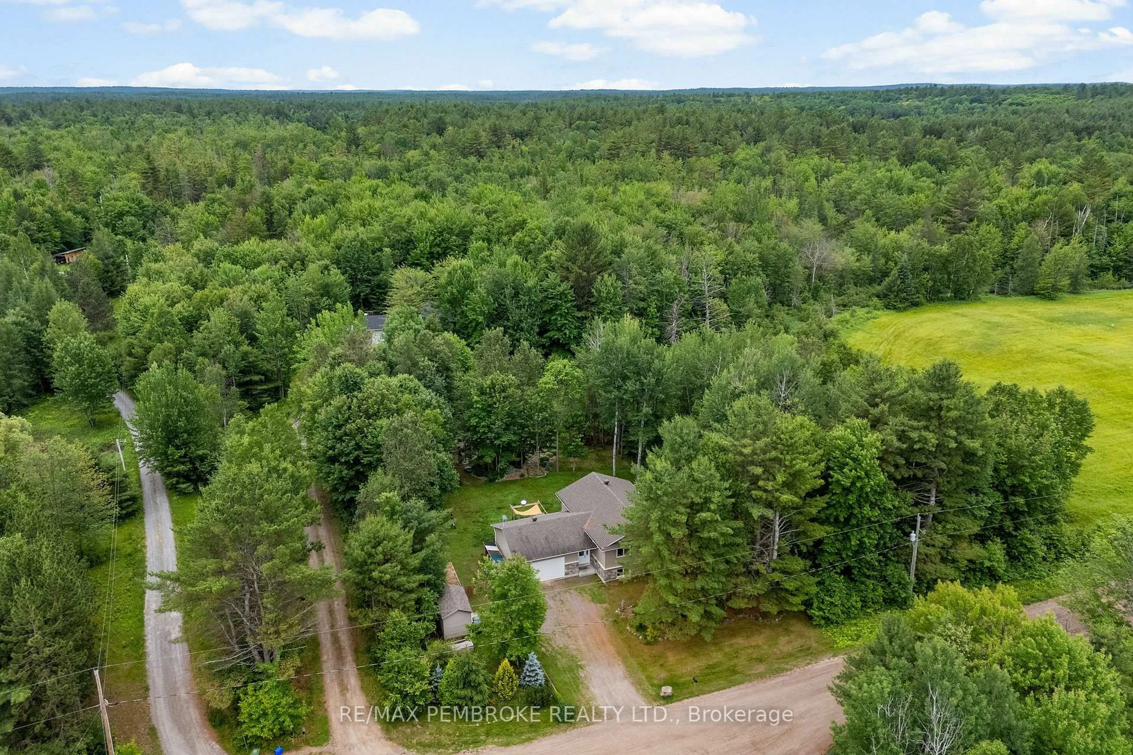 A pic from outside/outdoor area/front of a property/back of a property/a pic from drone, forest/trees view for 5 Pitzner Rd, Petawawa Ontario K8A 6W7