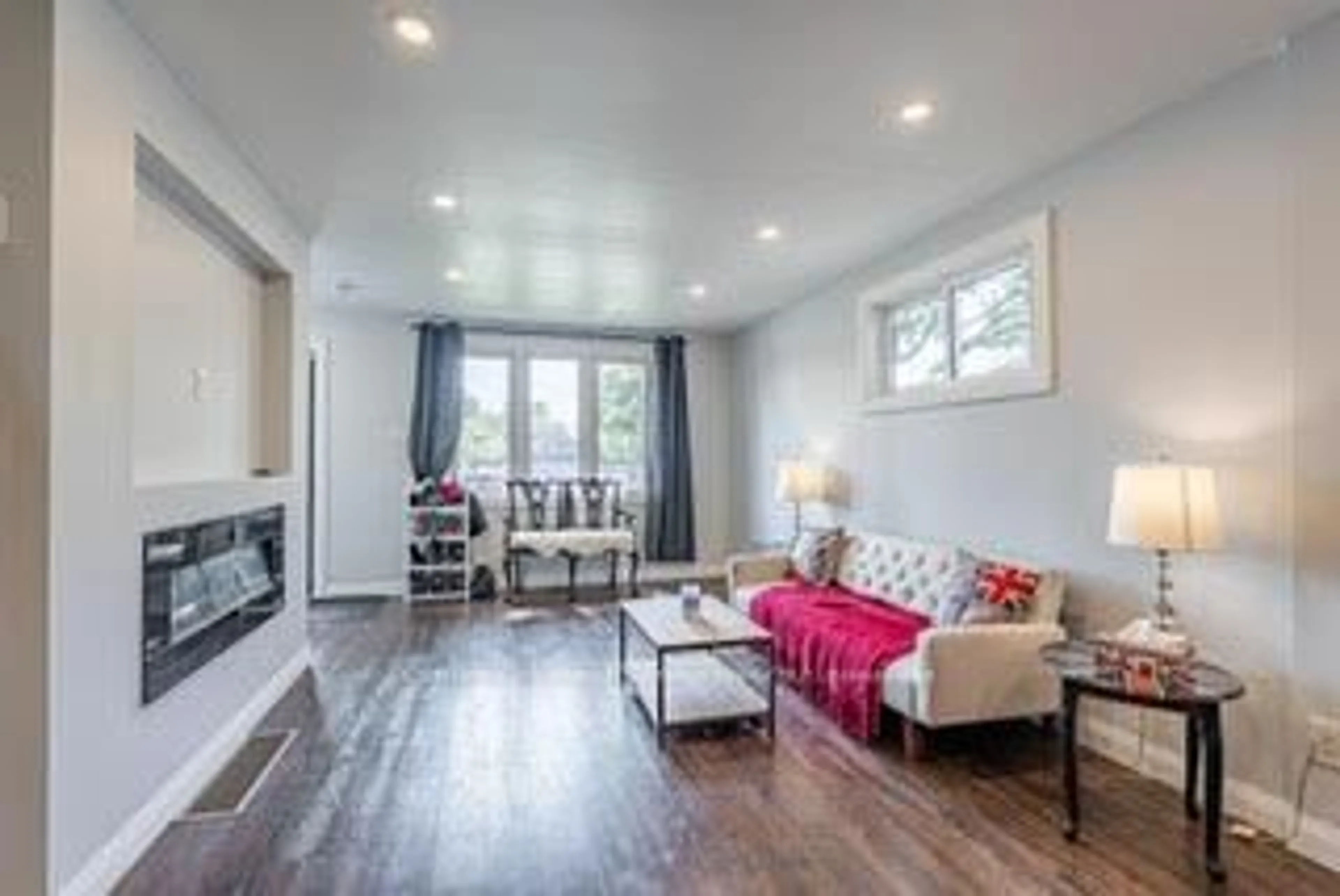 Living room with furniture, wood/laminate floor for 766 Glasgow St, London East Ontario N5Y 1V9