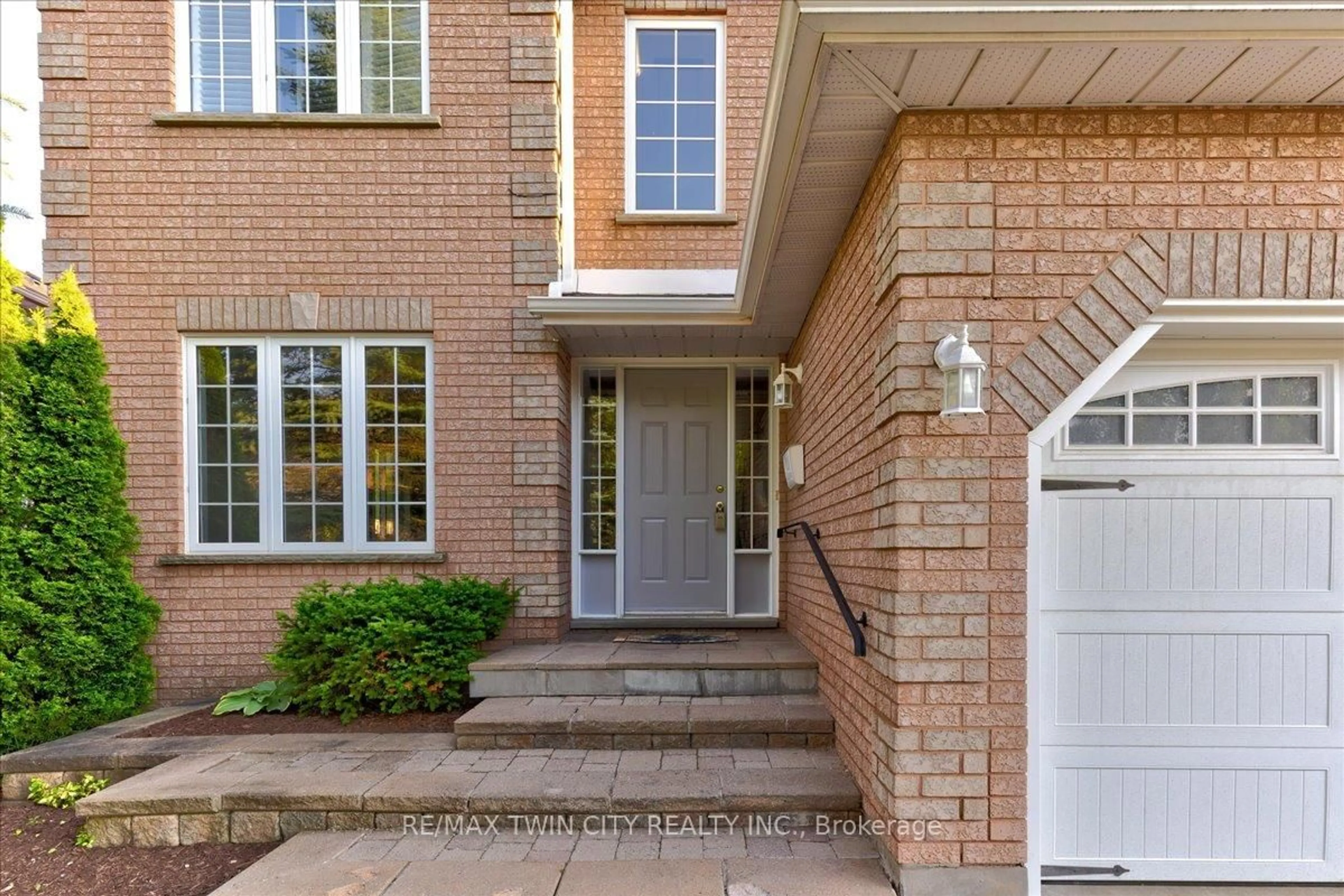 Home with brick exterior material, street for 310 Westforest Tr, Kitchener Ontario N2N 3J1