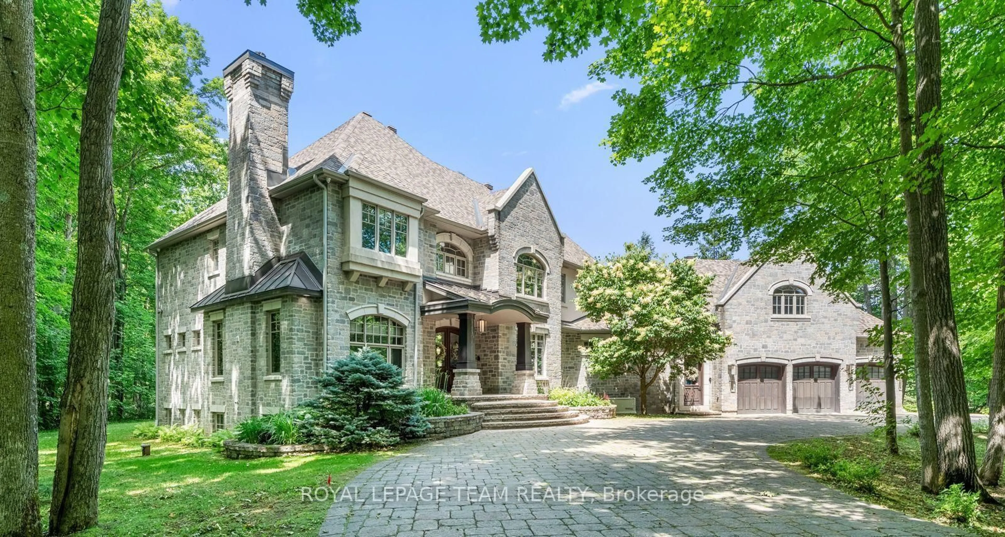 Home with brick exterior material, street for 33 Marchbrook Circ, Ottawa Ontario K2W 1A1