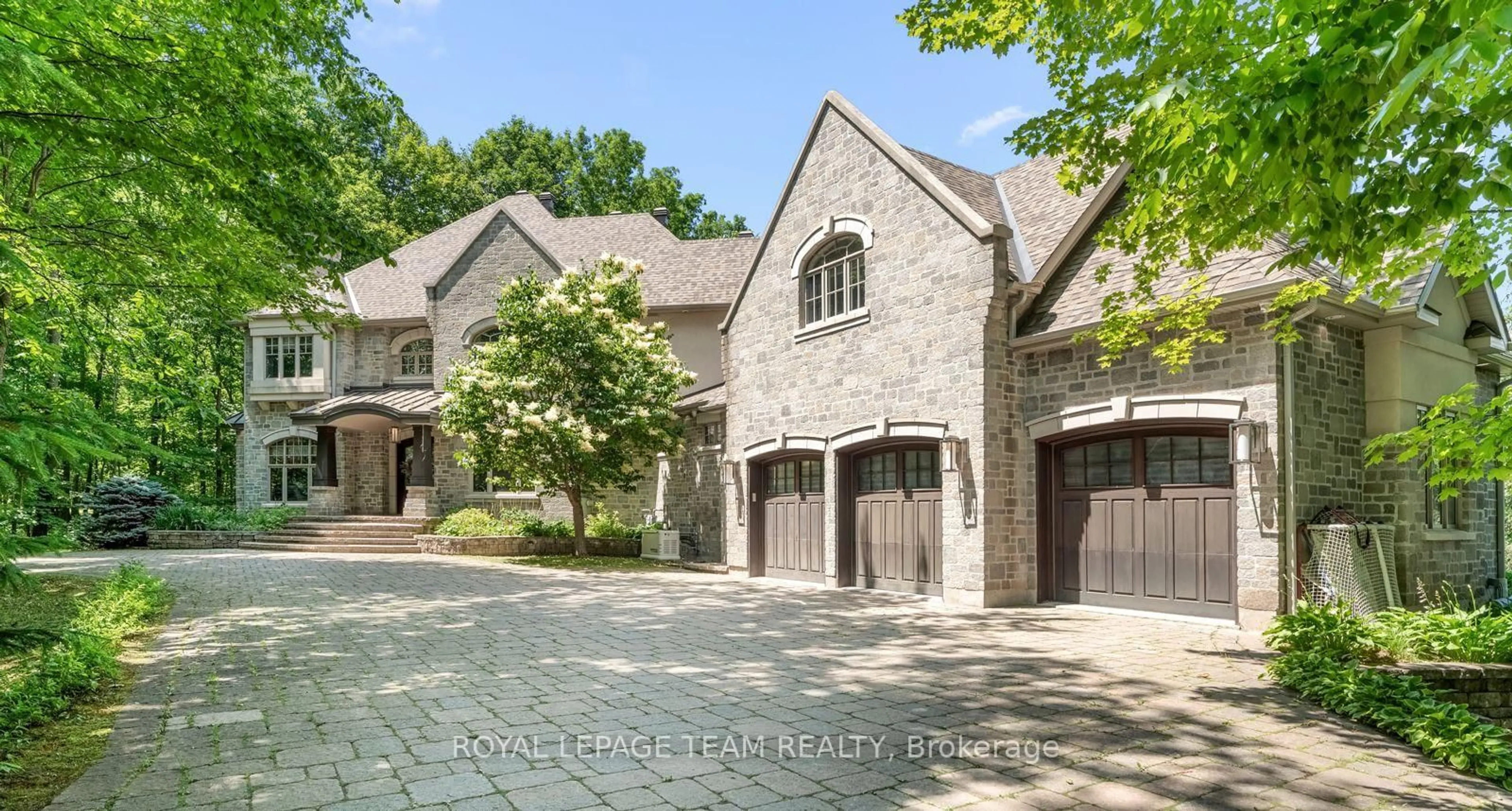 Home with brick exterior material, street for 33 Marchbrook Circ, Ottawa Ontario K2W 1A1