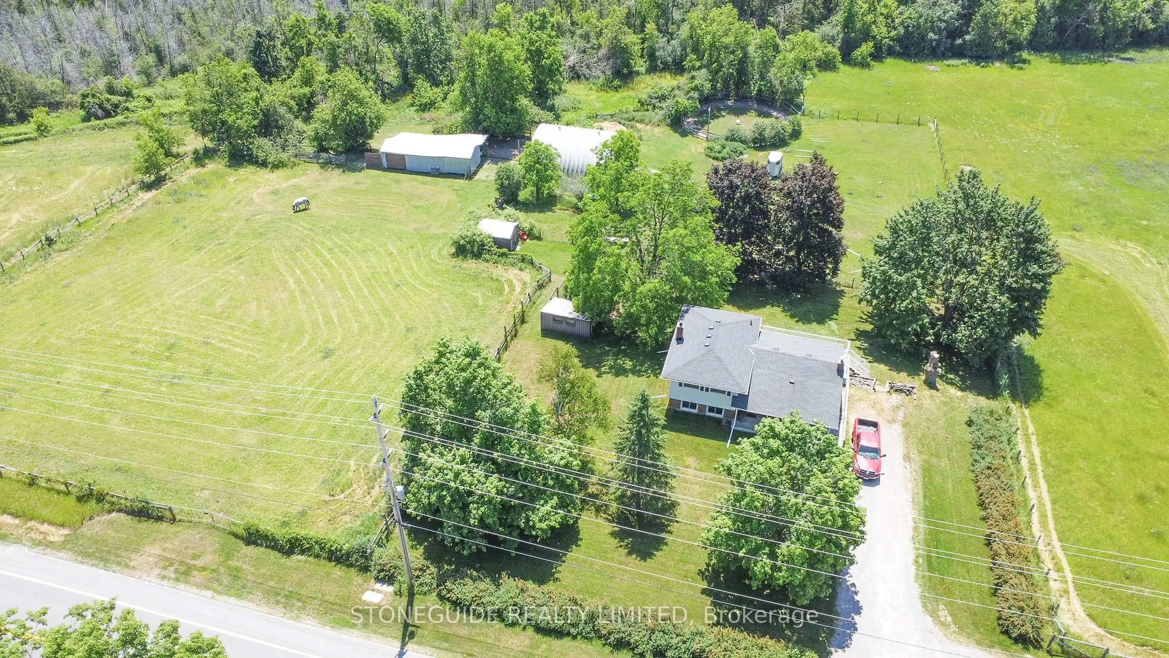 A pic from outside/outdoor area/front of a property/back of a property/a pic from drone, unknown for 527 Lily Lake Rd, Selwyn Ontario K9J 6X3