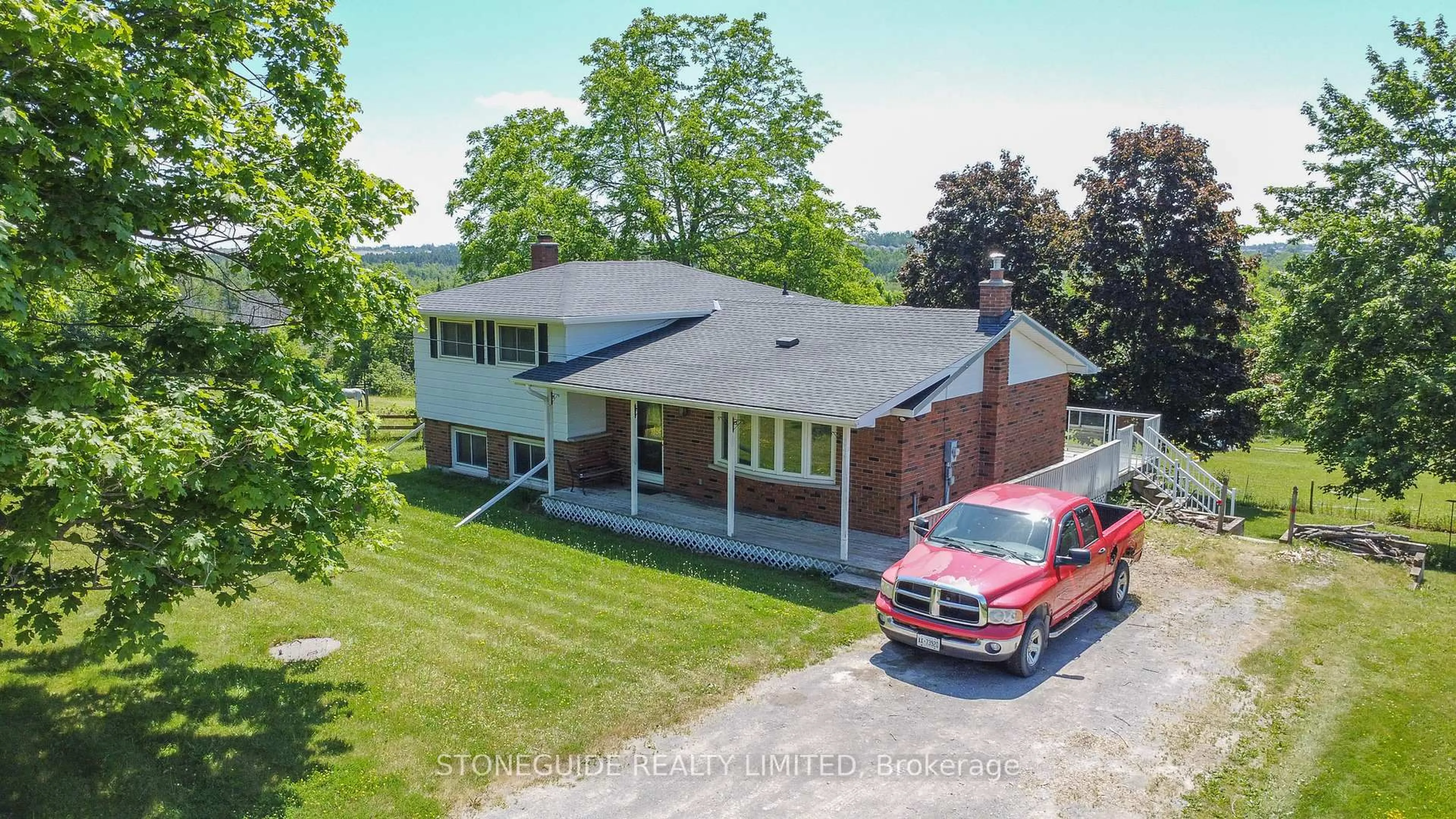 A pic from outside/outdoor area/front of a property/back of a property/a pic from drone, building for 527 Lily Lake Rd, Selwyn Ontario K9J 6X3