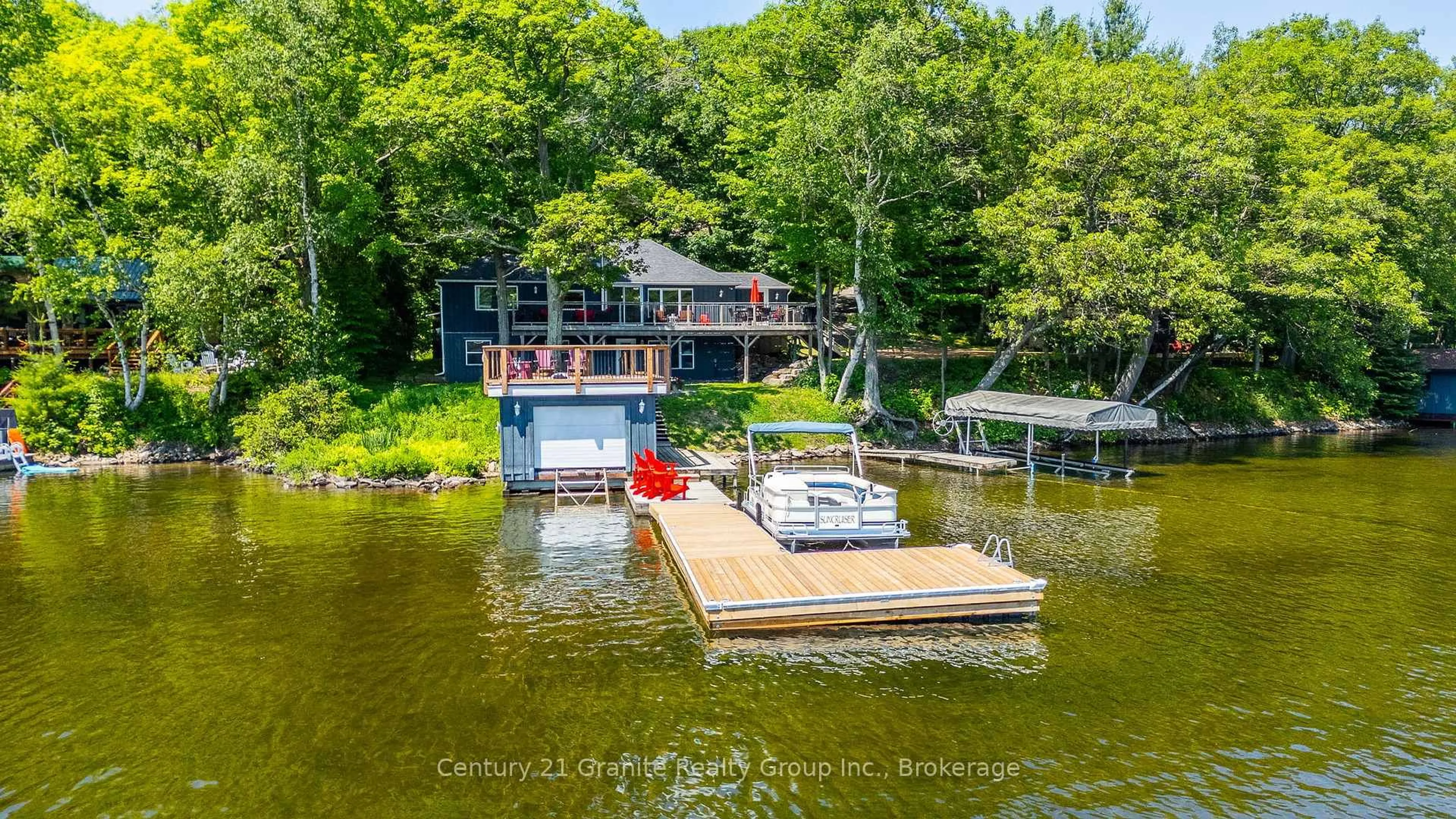 A pic from outside/outdoor area/front of a property/back of a property/a pic from drone, water/lake/river/ocean view for 1025 Sage Dr, Minden Hills Ontario K0M 2K0