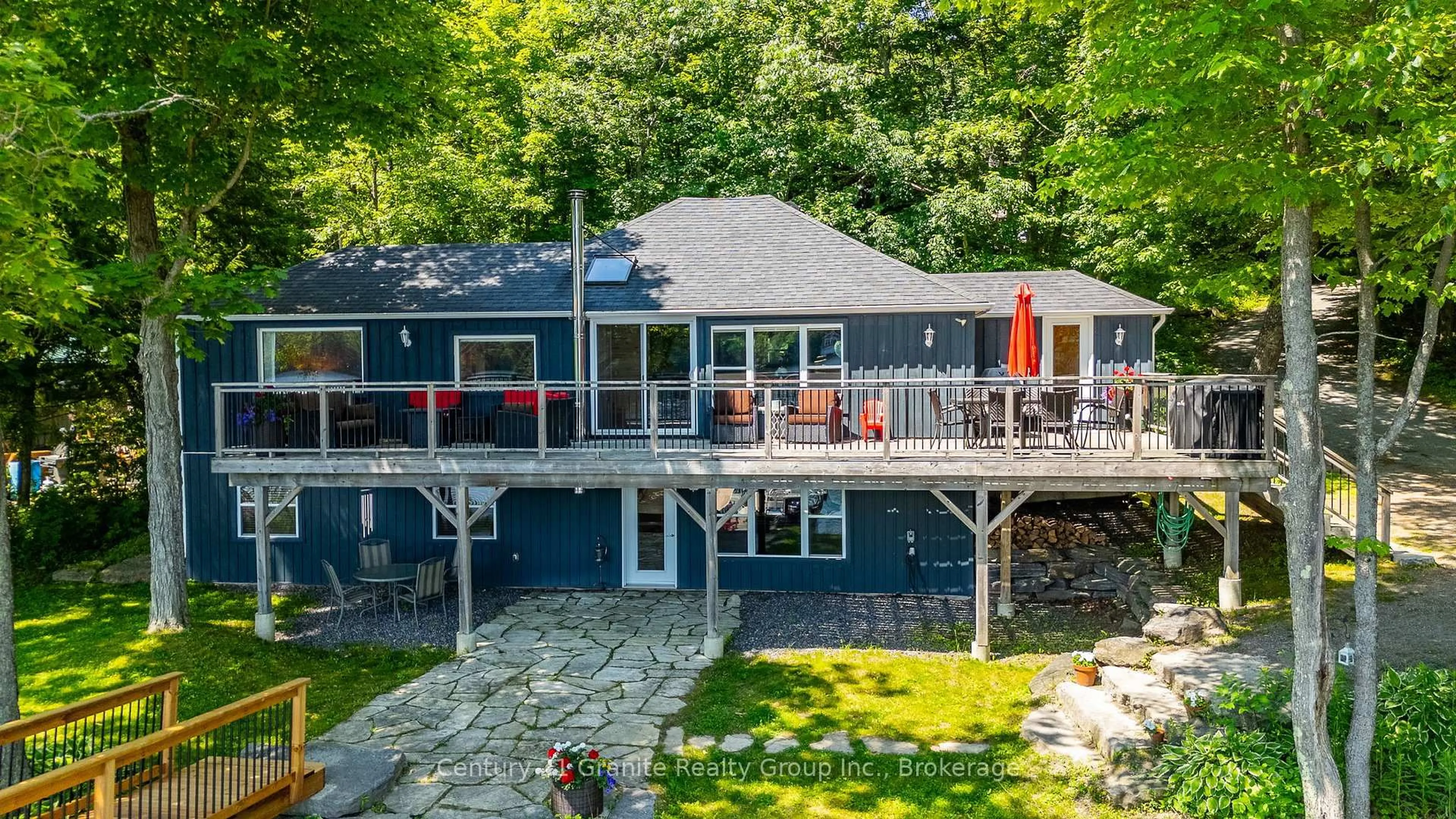 A pic from outside/outdoor area/front of a property/back of a property/a pic from drone, water/lake/river/ocean view for 1025 Sage Dr, Minden Hills Ontario K0M 2K0