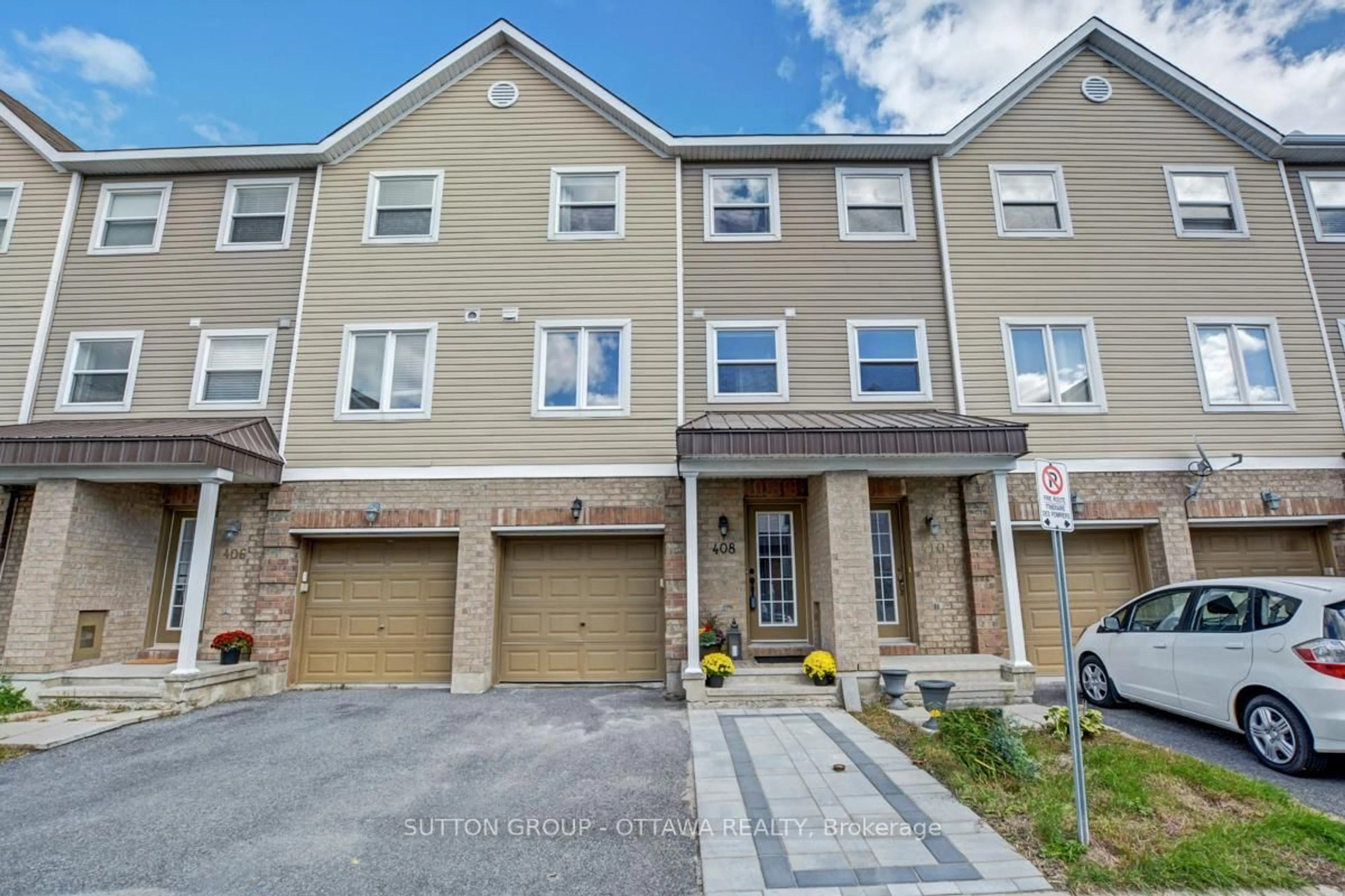 A pic from outside/outdoor area/front of a property/back of a property/a pic from drone, street for 408 Sadar Private, Ottawa Ontario K2J 3T3