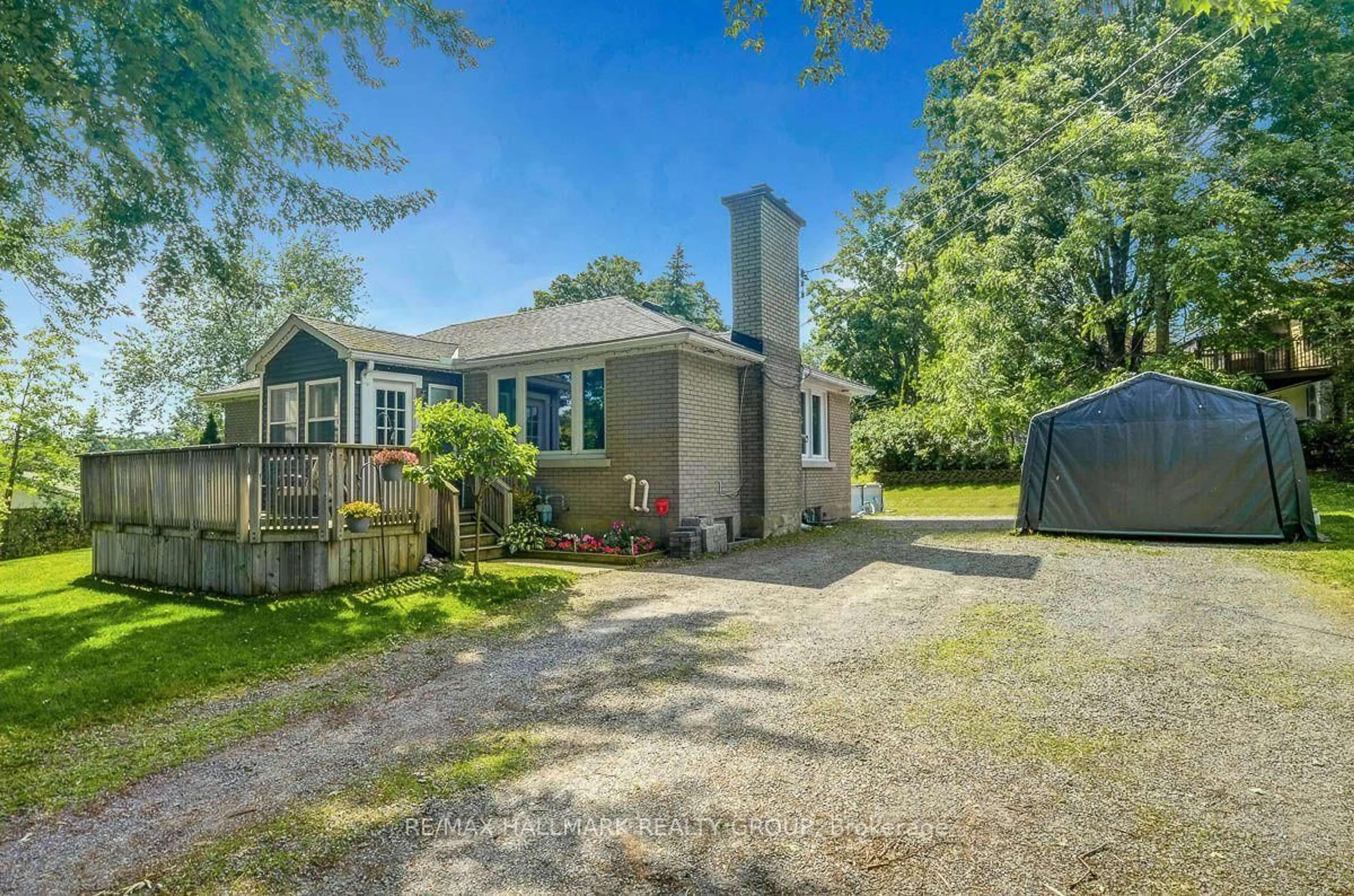A pic from outside/outdoor area/front of a property/back of a property/a pic from drone, street for 5483 West River Dr, Manotick Ontario K4M 1G8