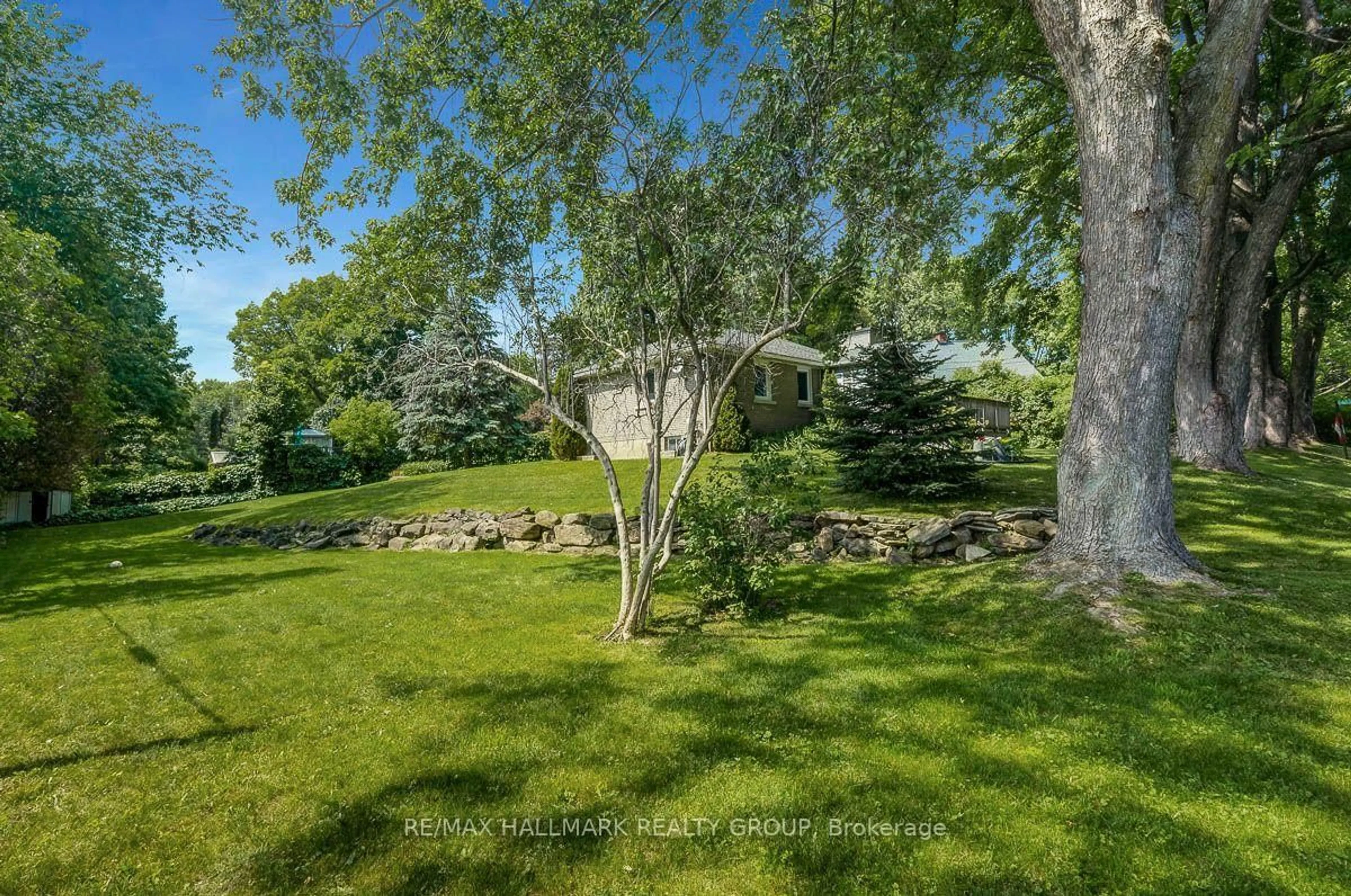 Patio, forest/trees view for 5483 West River Dr, Manotick Ontario K4M 1G8