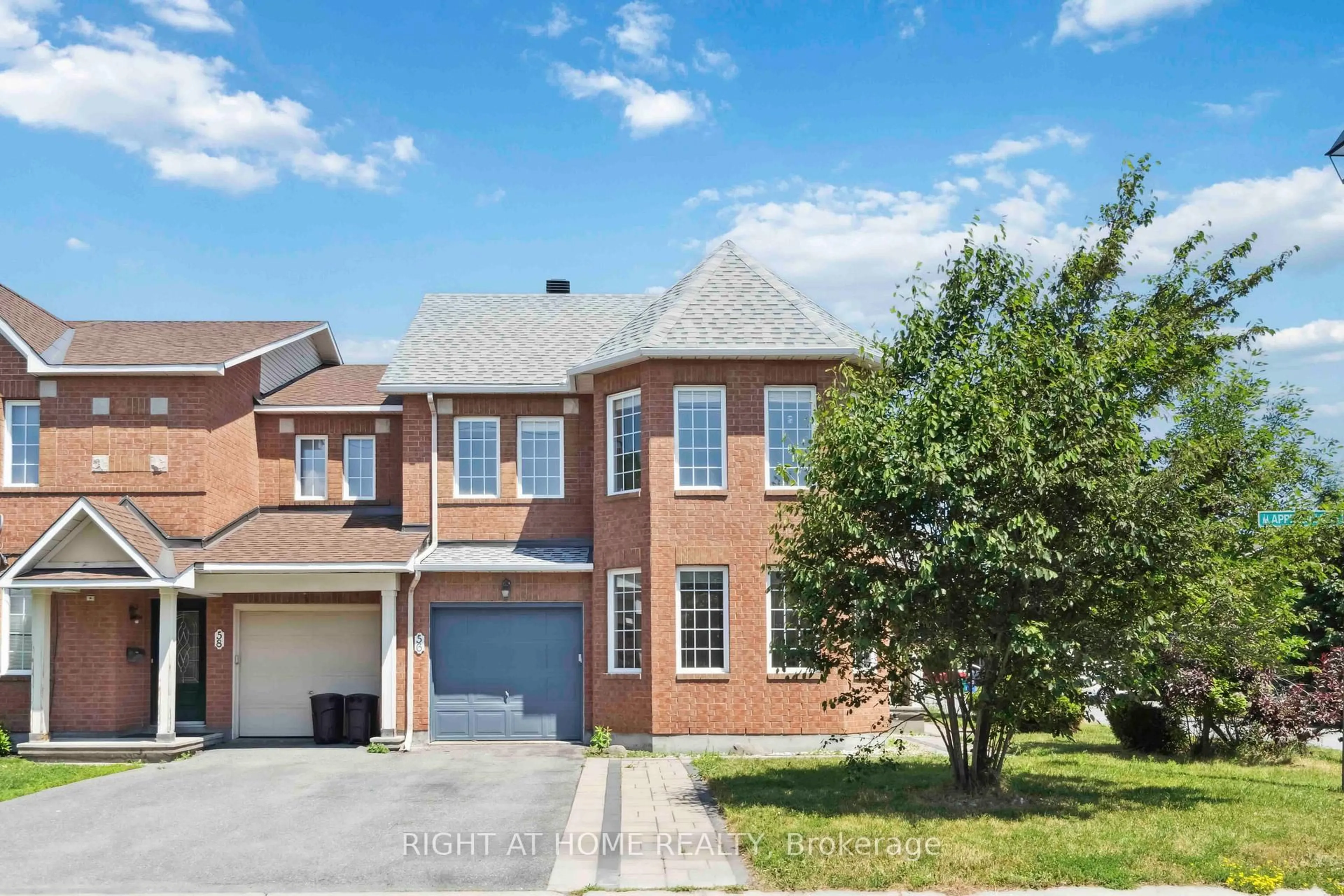Home with brick exterior material, street for 56 Appledale Dr, Ottawa Ontario K2J 4W6