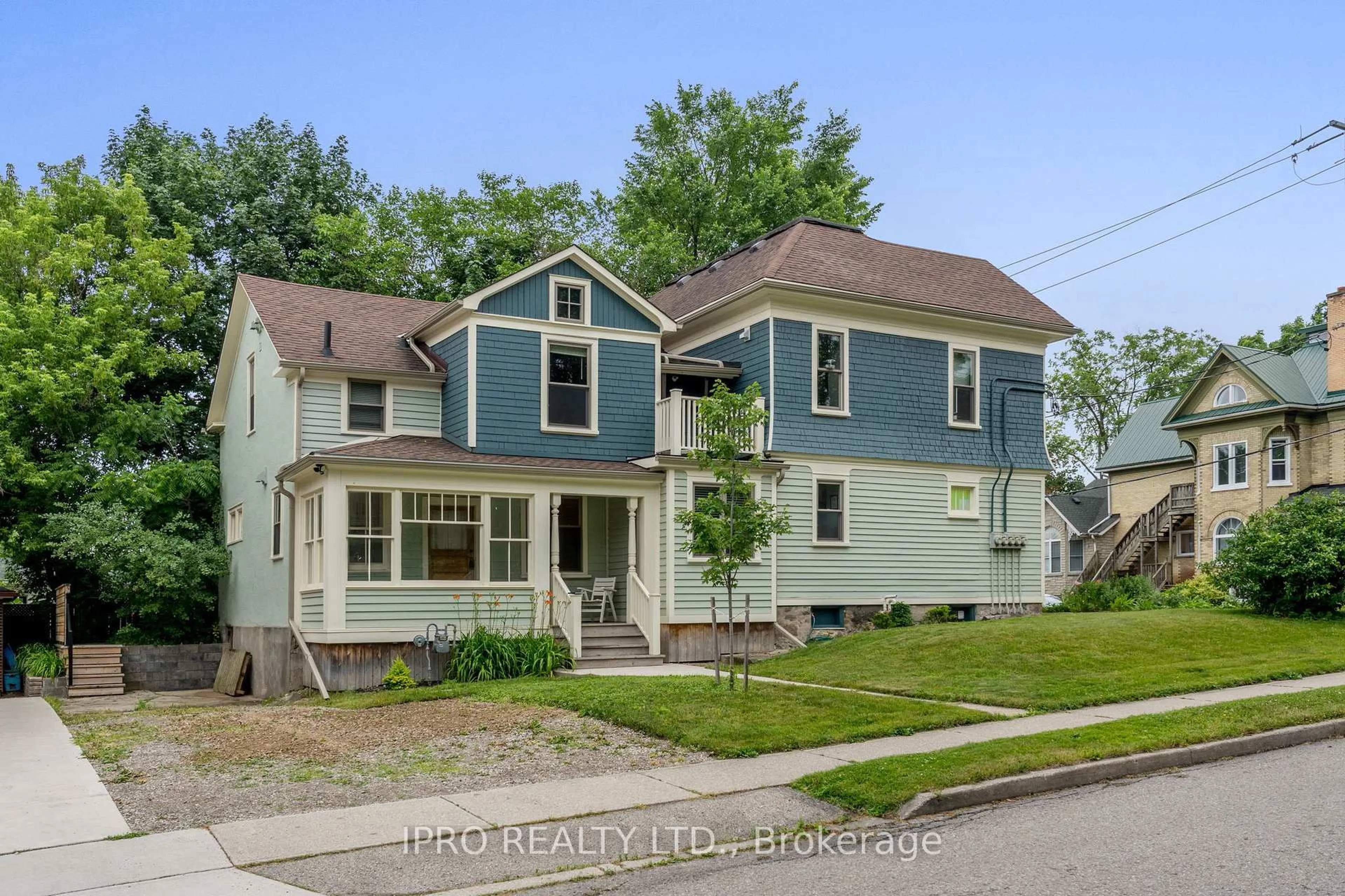Home with vinyl exterior material, street for 14 Young St, Waterloo Ontario N2L 2Y8