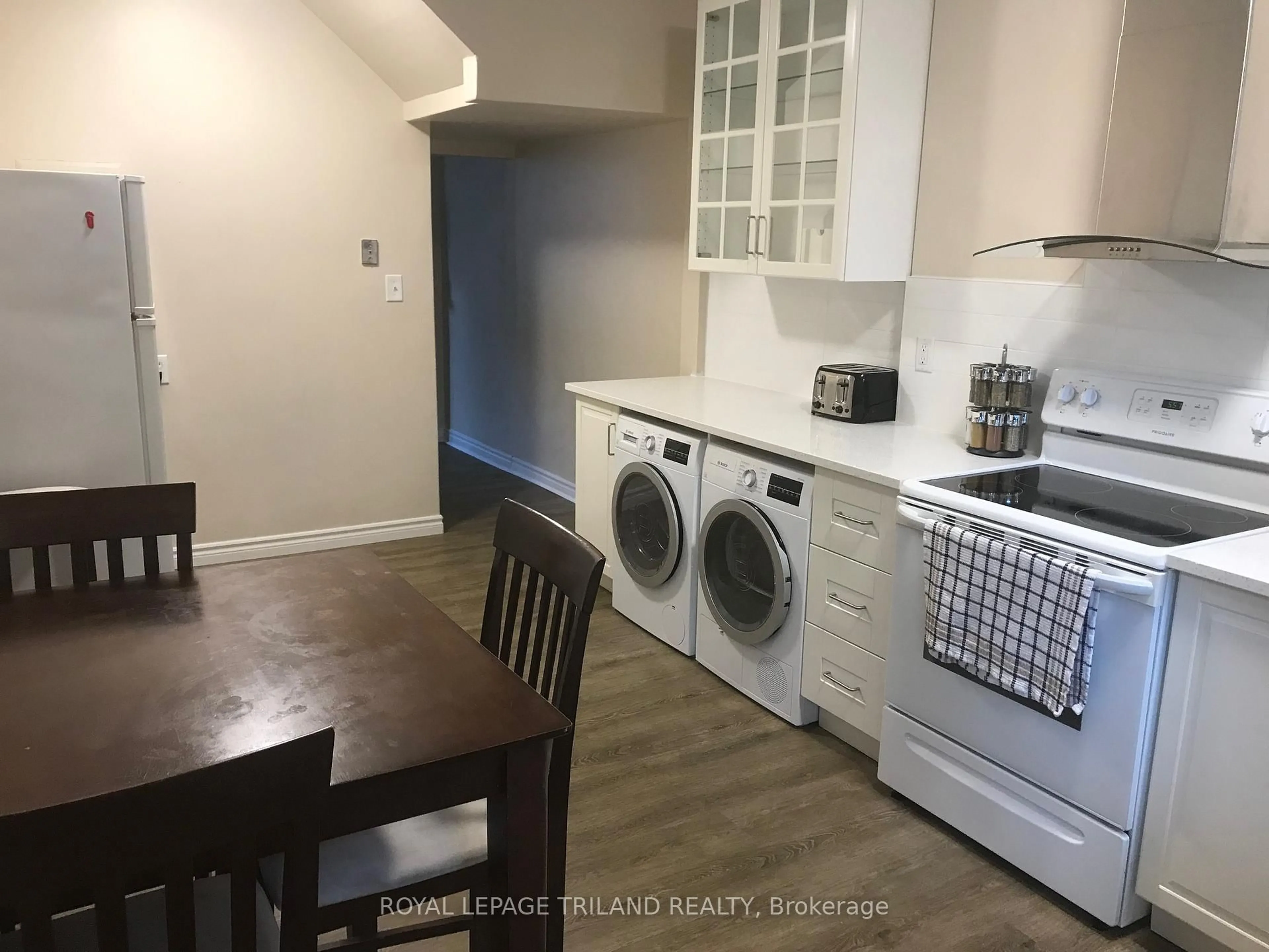 Kitchen with laundary machines, unknown for 283 Hyman St, London East Ontario N6B 2G6