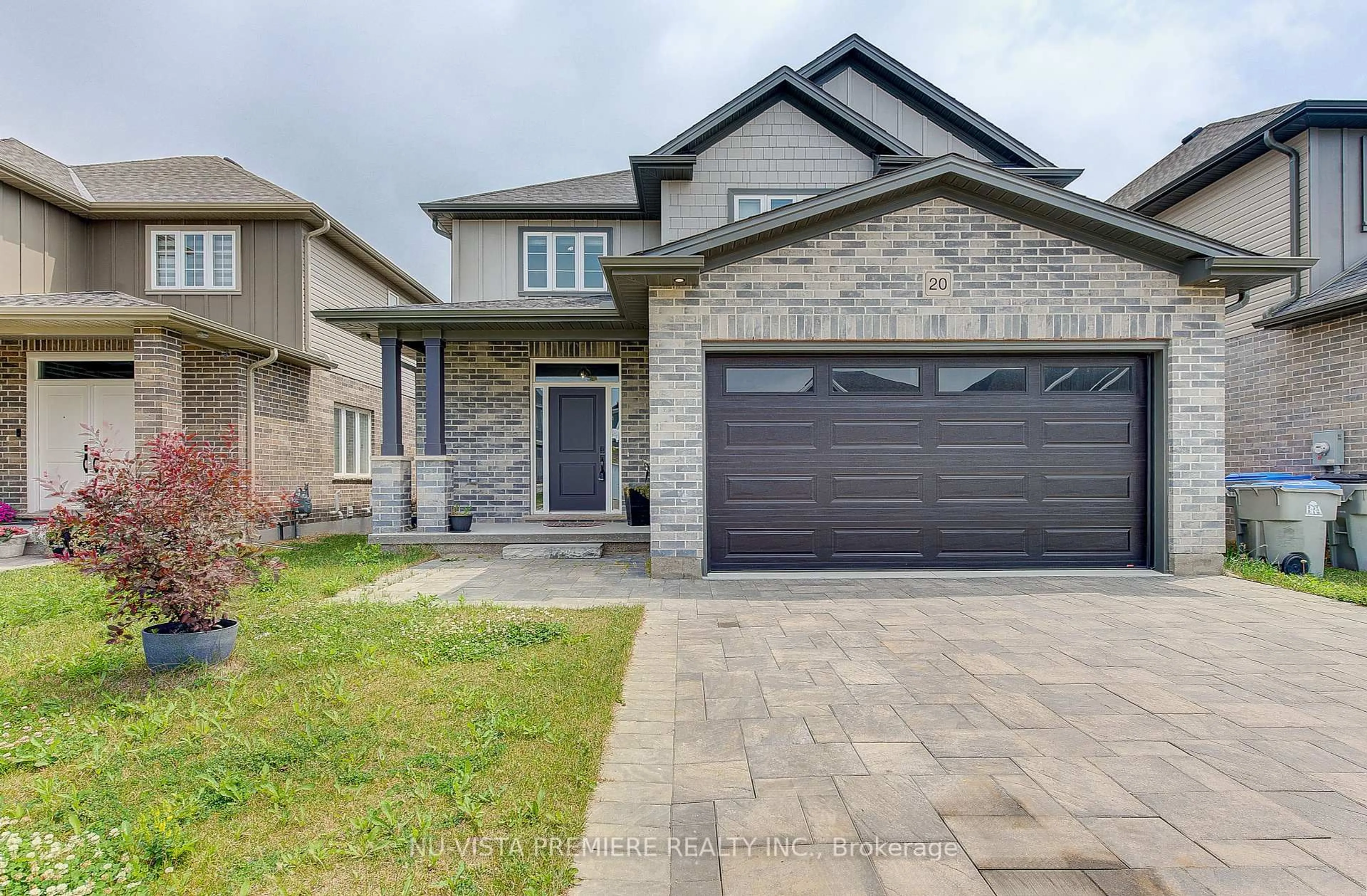 Home with brick exterior material, street for 20 Basil Cres, Middlesex Centre Ontario N0M 2A0