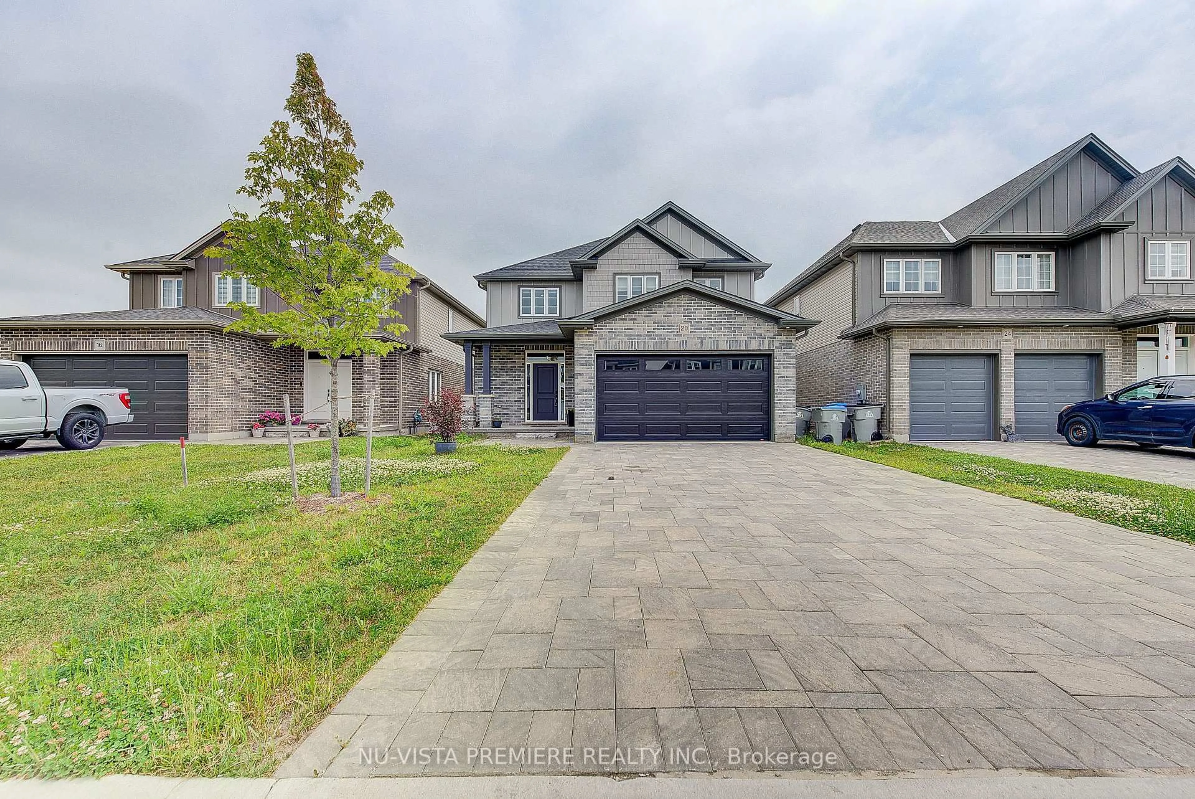 A pic from outside/outdoor area/front of a property/back of a property/a pic from drone, street for 20 Basil Cres, Middlesex Centre Ontario N0M 2A0