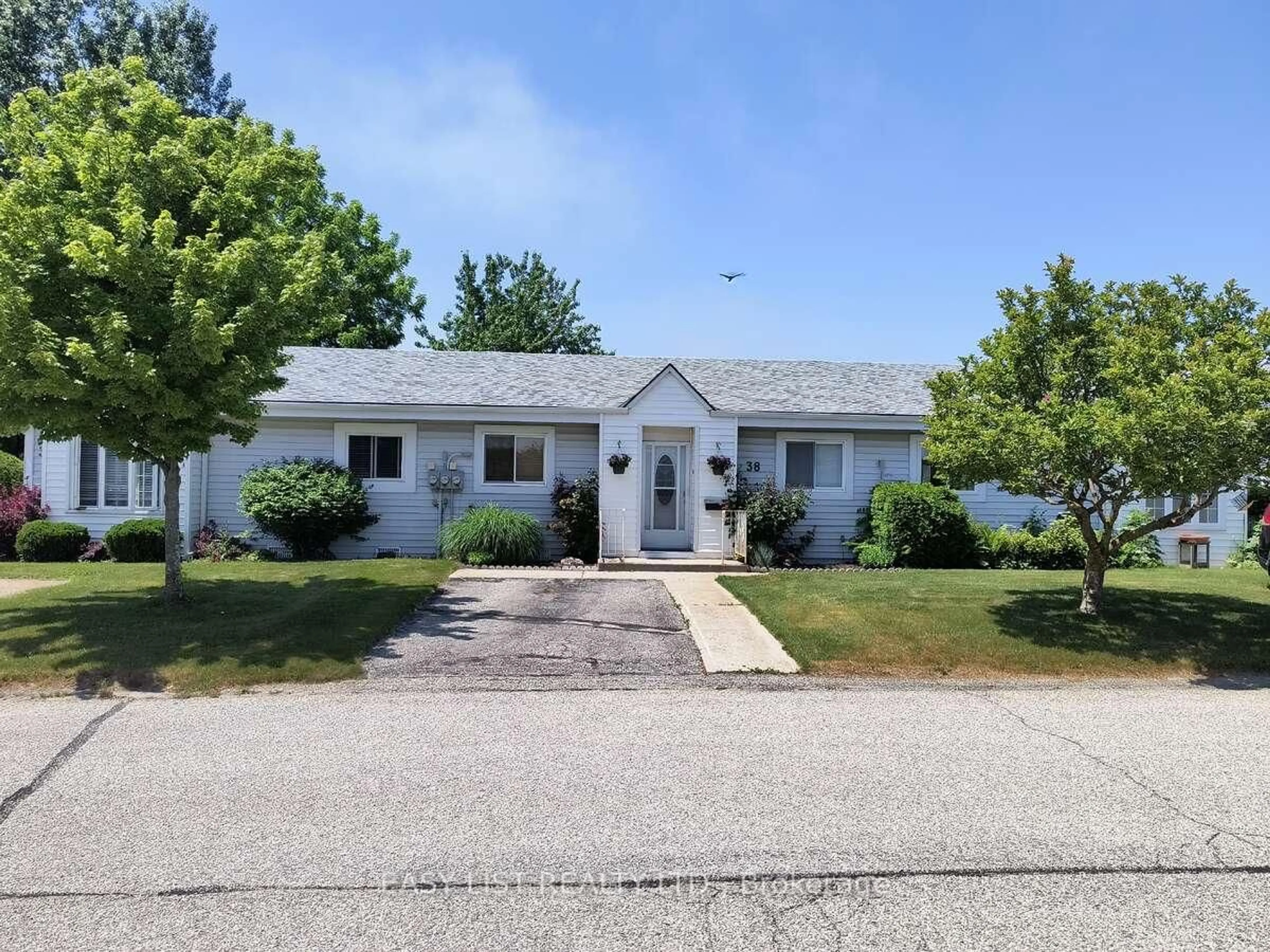 Home with vinyl exterior material, street for 303 Waterloo St #38, Saugeen Shores Ontario N0H 2C1