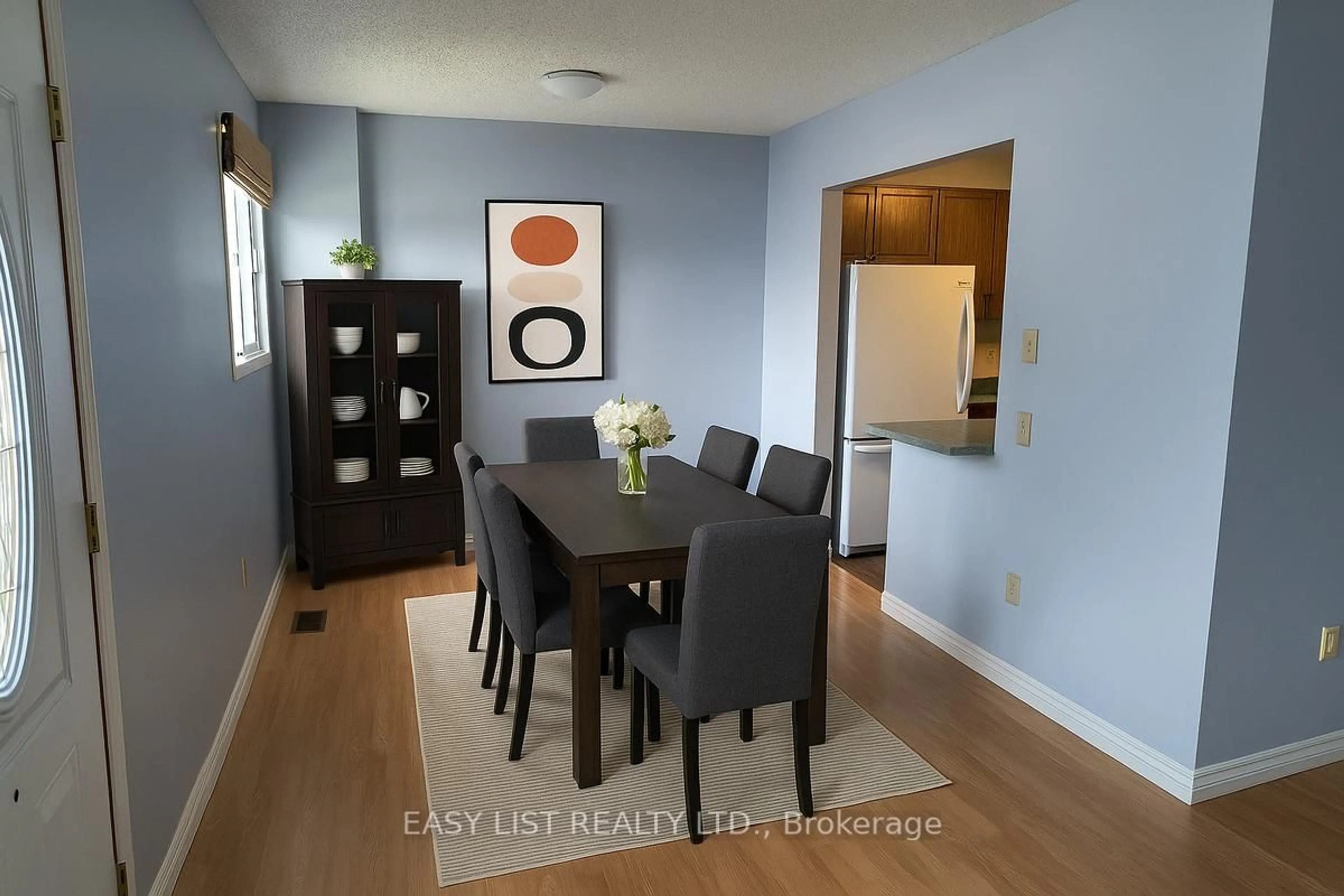 Dining room, wood/laminate floor for 303 Waterloo St #38, Saugeen Shores Ontario N0H 2C1