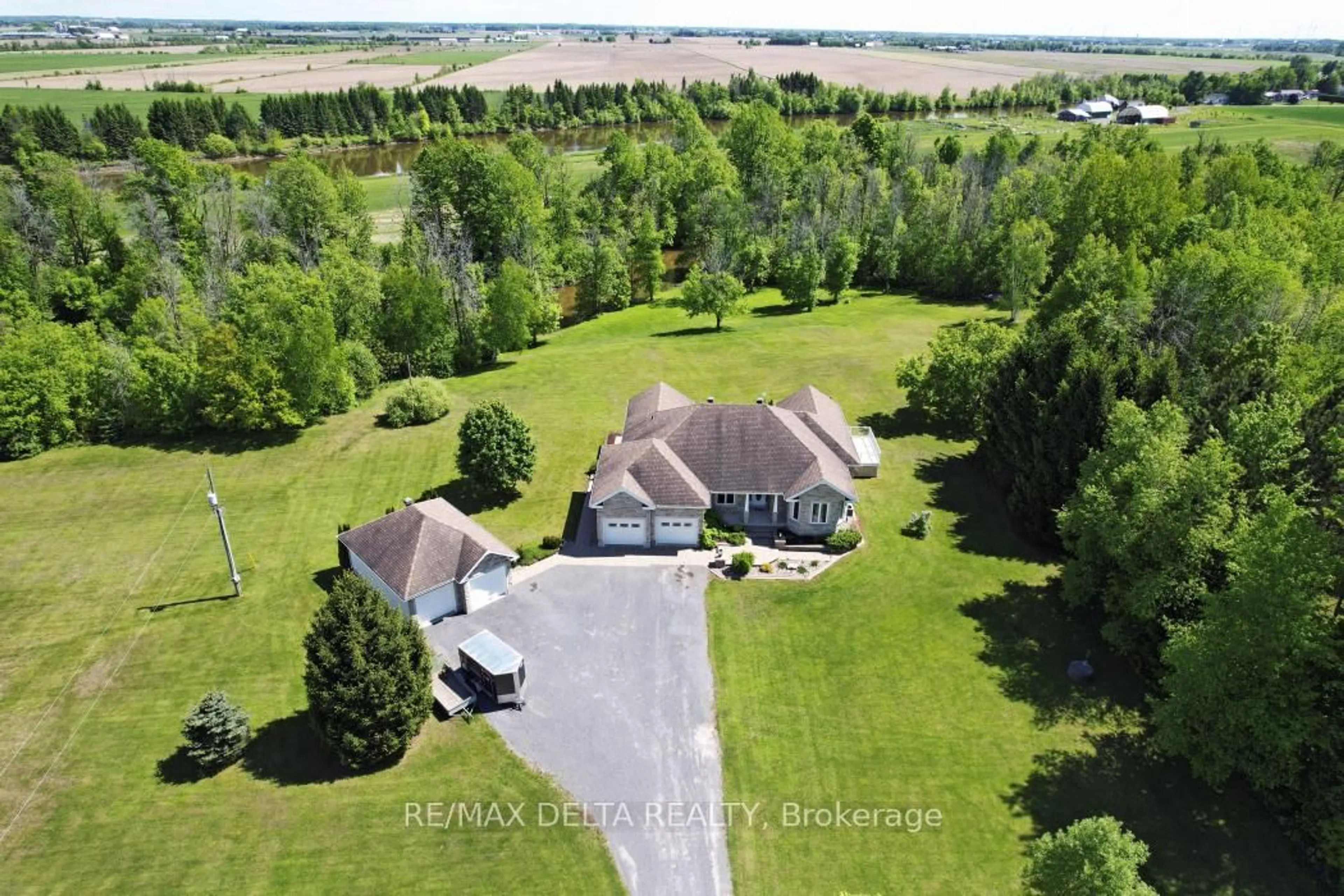 A pic from outside/outdoor area/front of a property/back of a property/a pic from drone, water/lake/river/ocean view for 1281 650 Rte, The Nation Ontario K0A 1M0