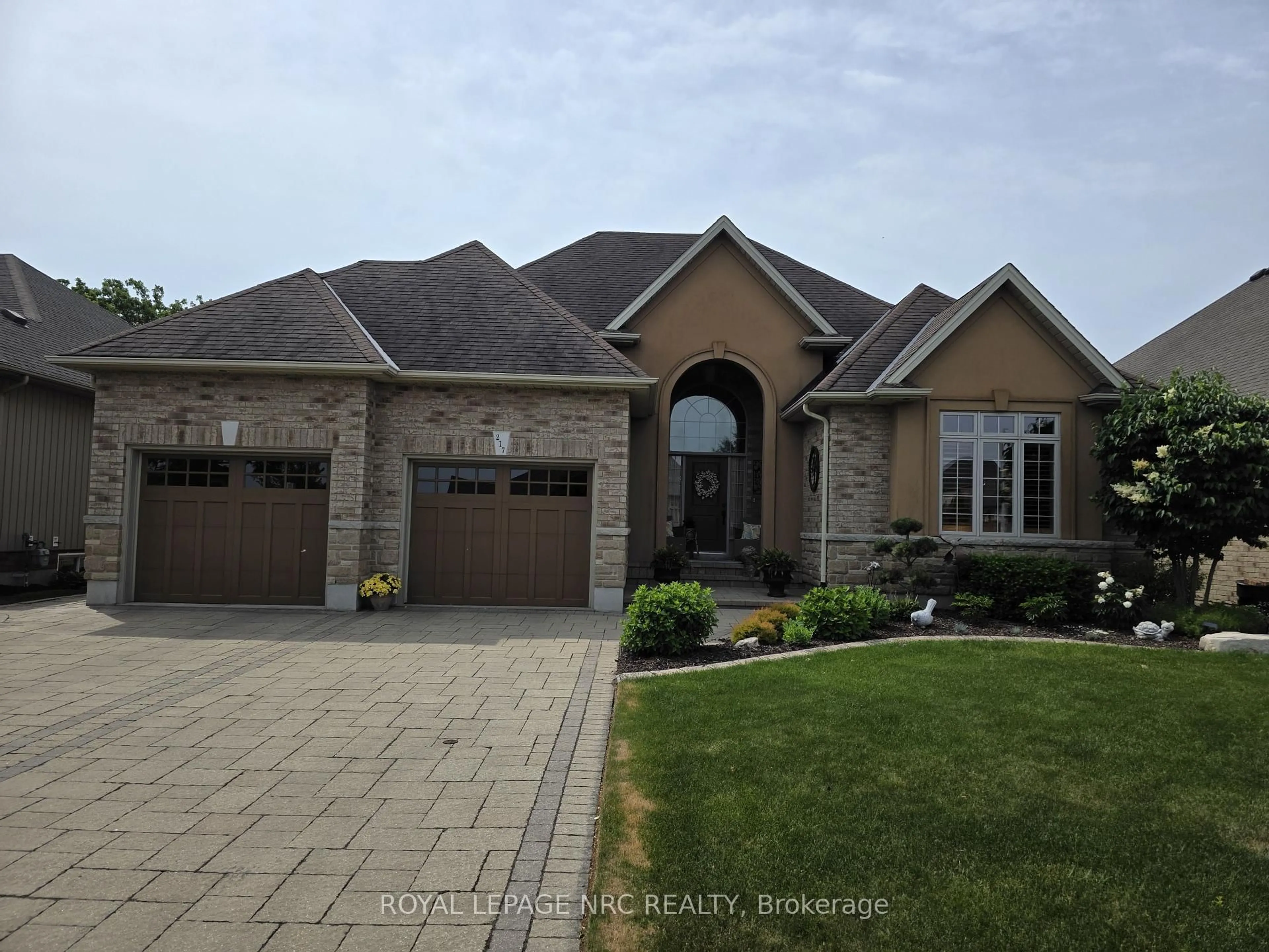Home with brick exterior material, street for 217 Creekside Dr, Welland Ontario L3C 0B6