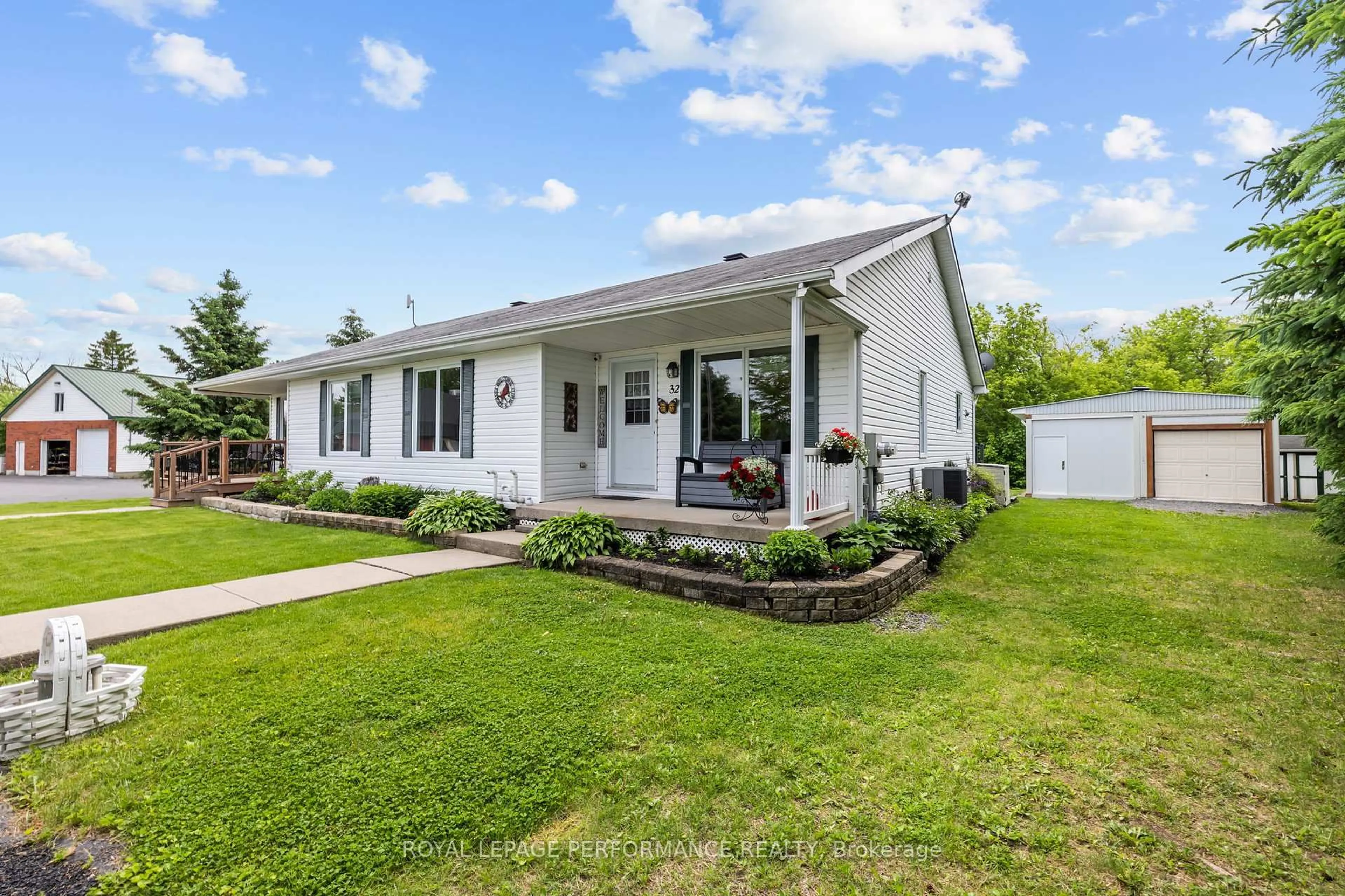 Home with vinyl exterior material, street for 32 Genier St, The Nation Ontario K0A 3C0