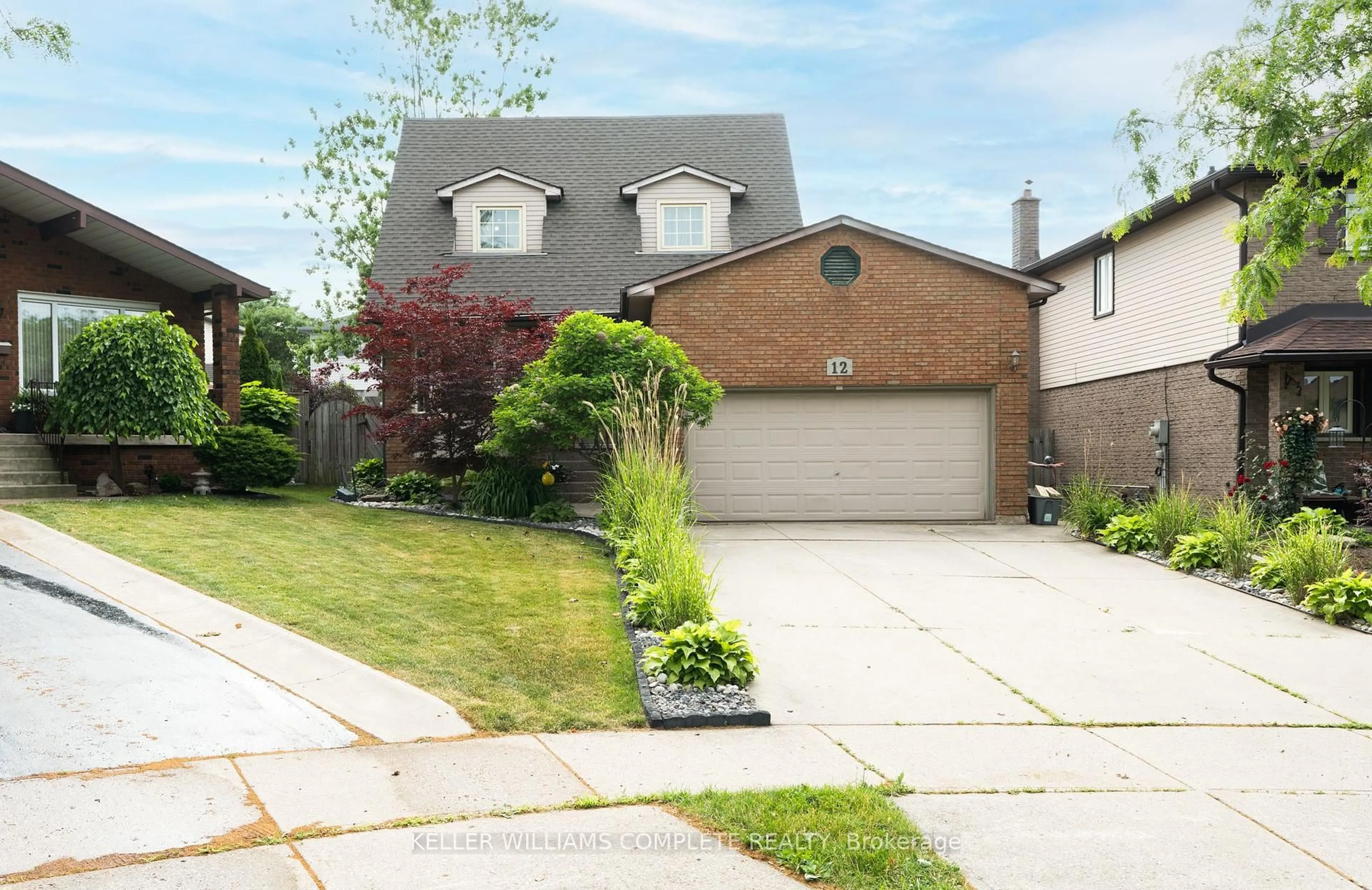 Home with brick exterior material, street for 12 Sutton Crt, Hamilton Ontario L8J 2E2