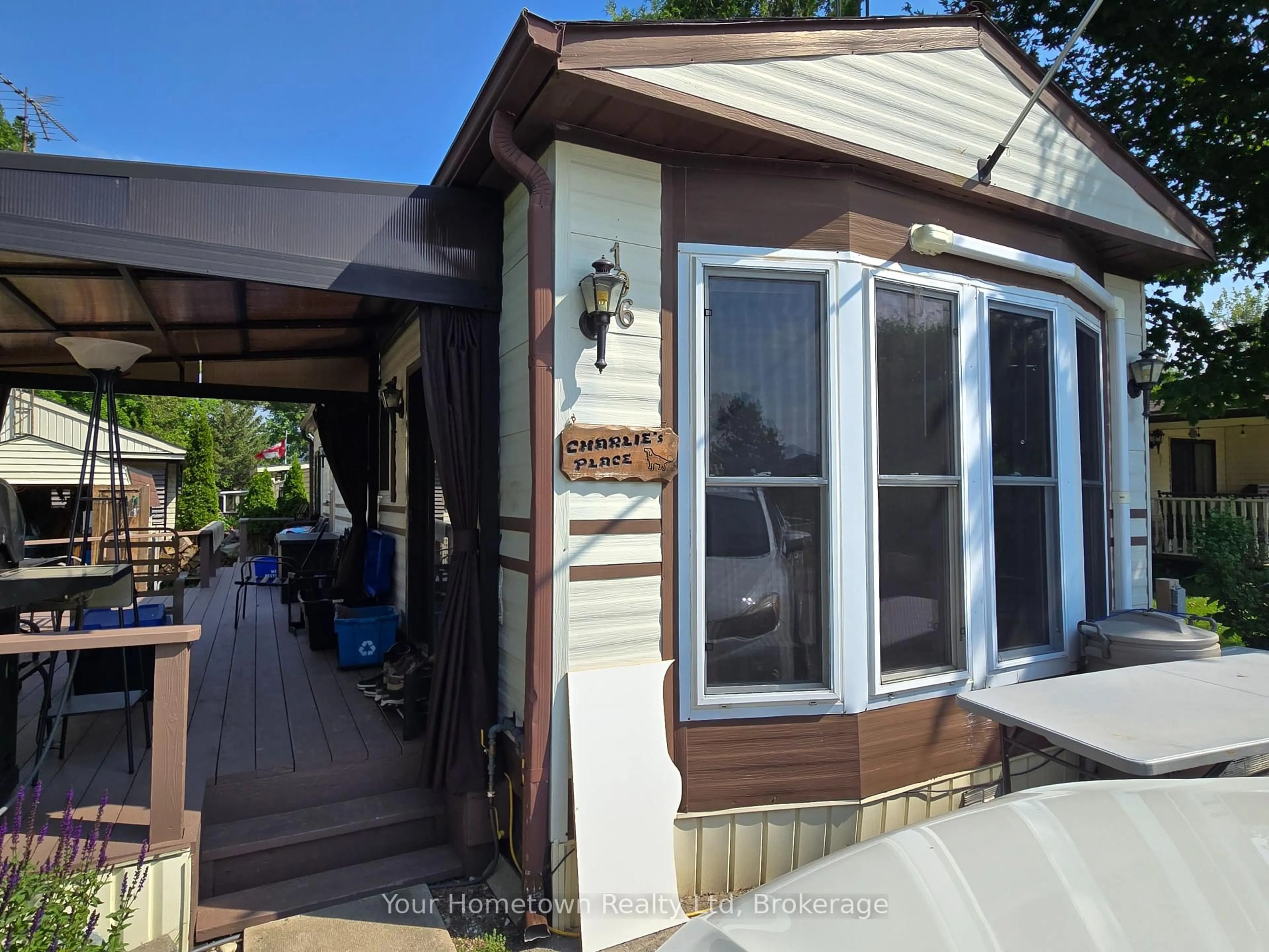 Home with vinyl exterior material, street for 196 Beach Rd, Centre Wellington Ontario N1M 2W5