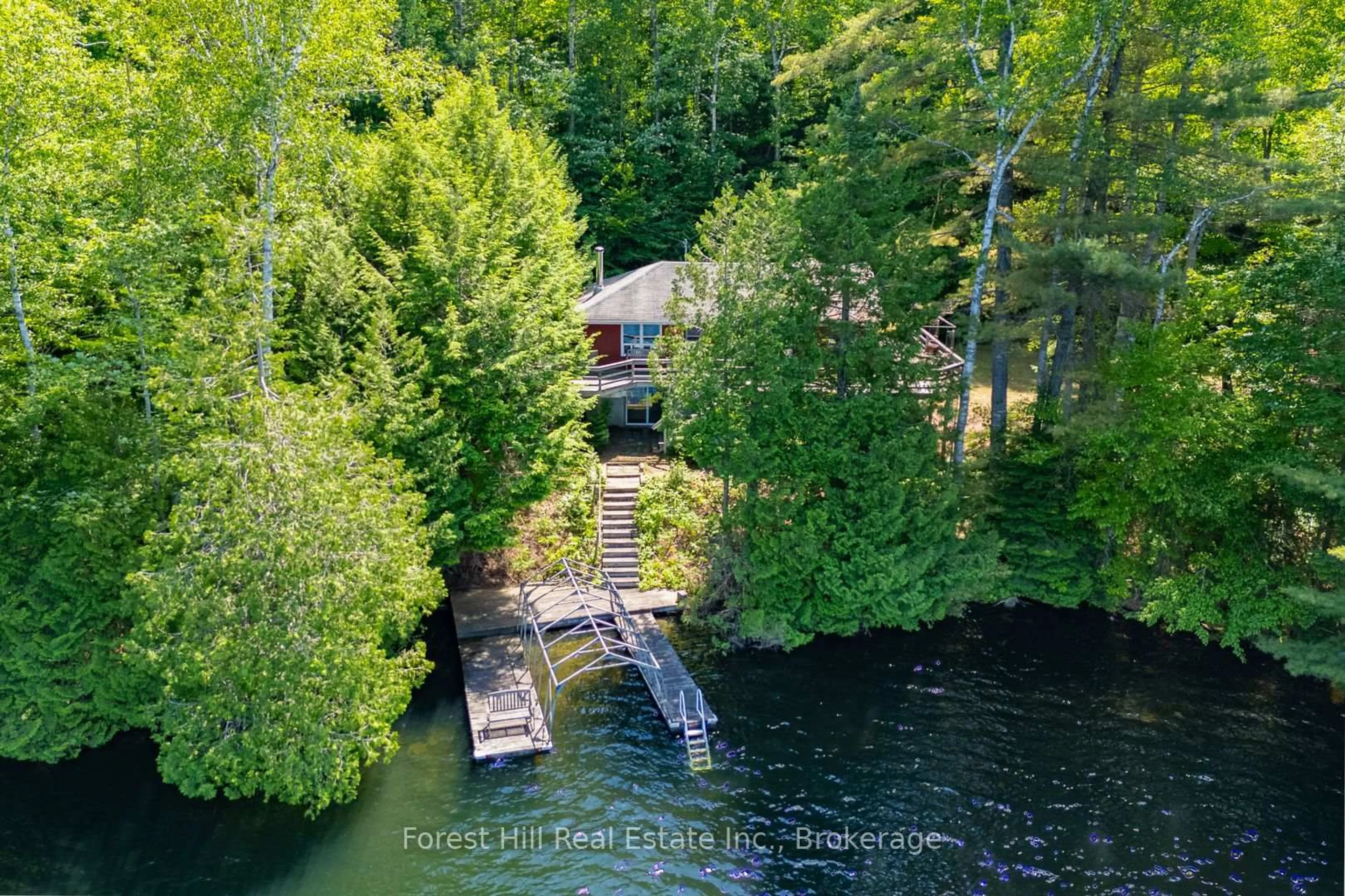 A pic from outside/outdoor area/front of a property/back of a property/a pic from drone, water/lake/river/ocean view for 2499 Kawagama Lake Rd, Algonquin Highlands Ontario P0A 1E0