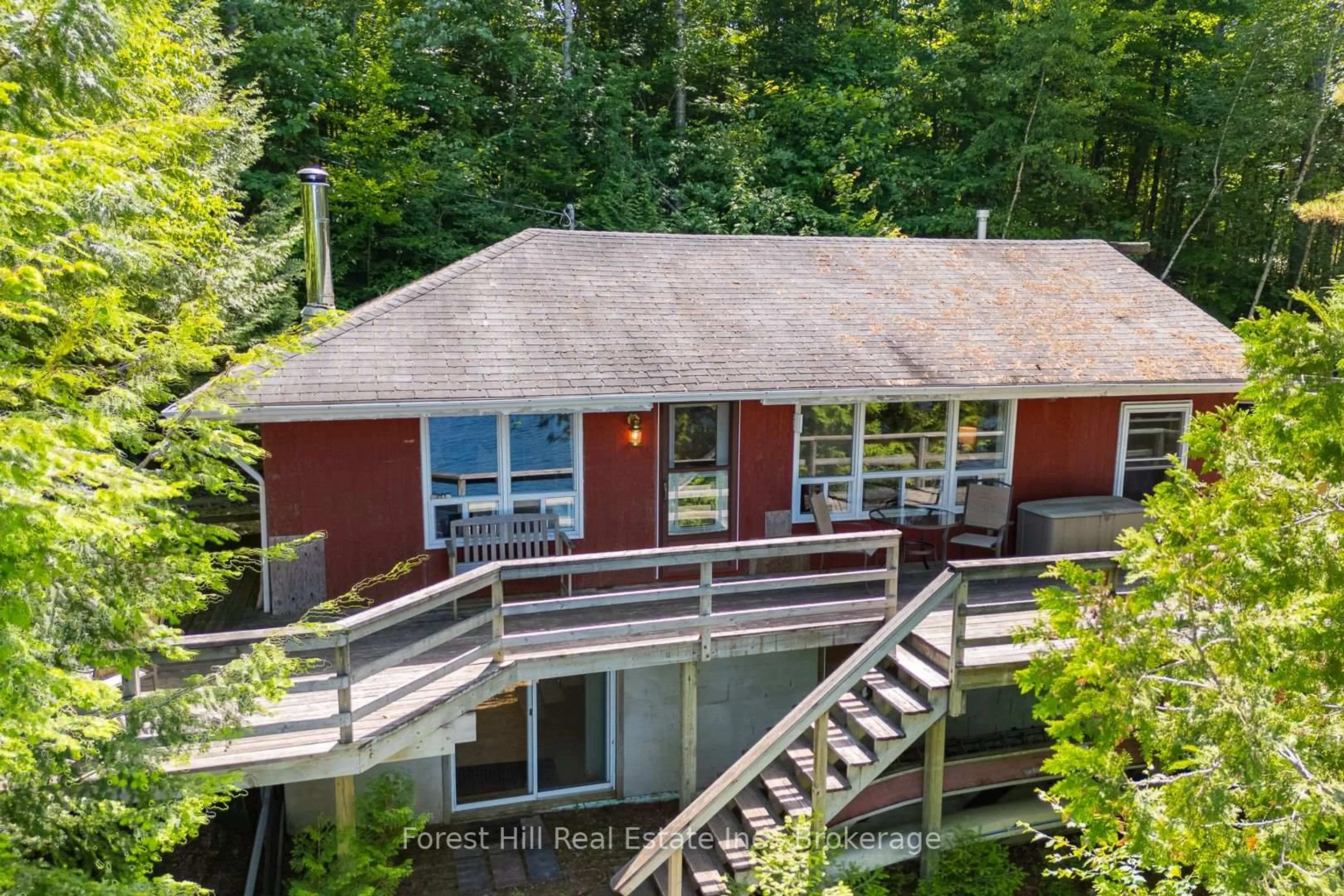 A pic from outside/outdoor area/front of a property/back of a property/a pic from drone, water/lake/river/ocean view for 2499 Kawagama Lake Rd, Algonquin Highlands Ontario P0A 1E0