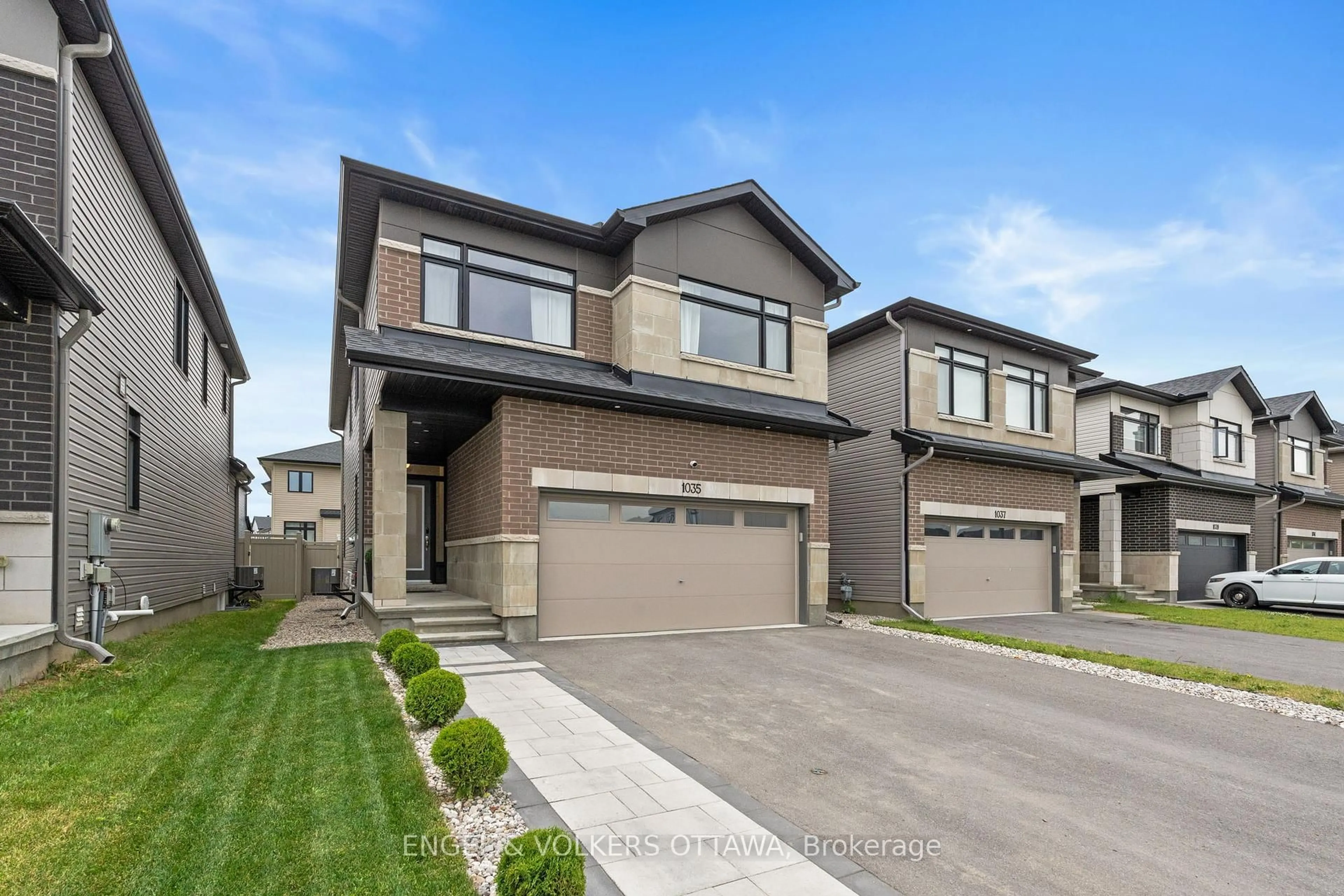 Home with brick exterior material, street for 1035 Hydrangea Ave, Manotick Ontario K4M 0L4