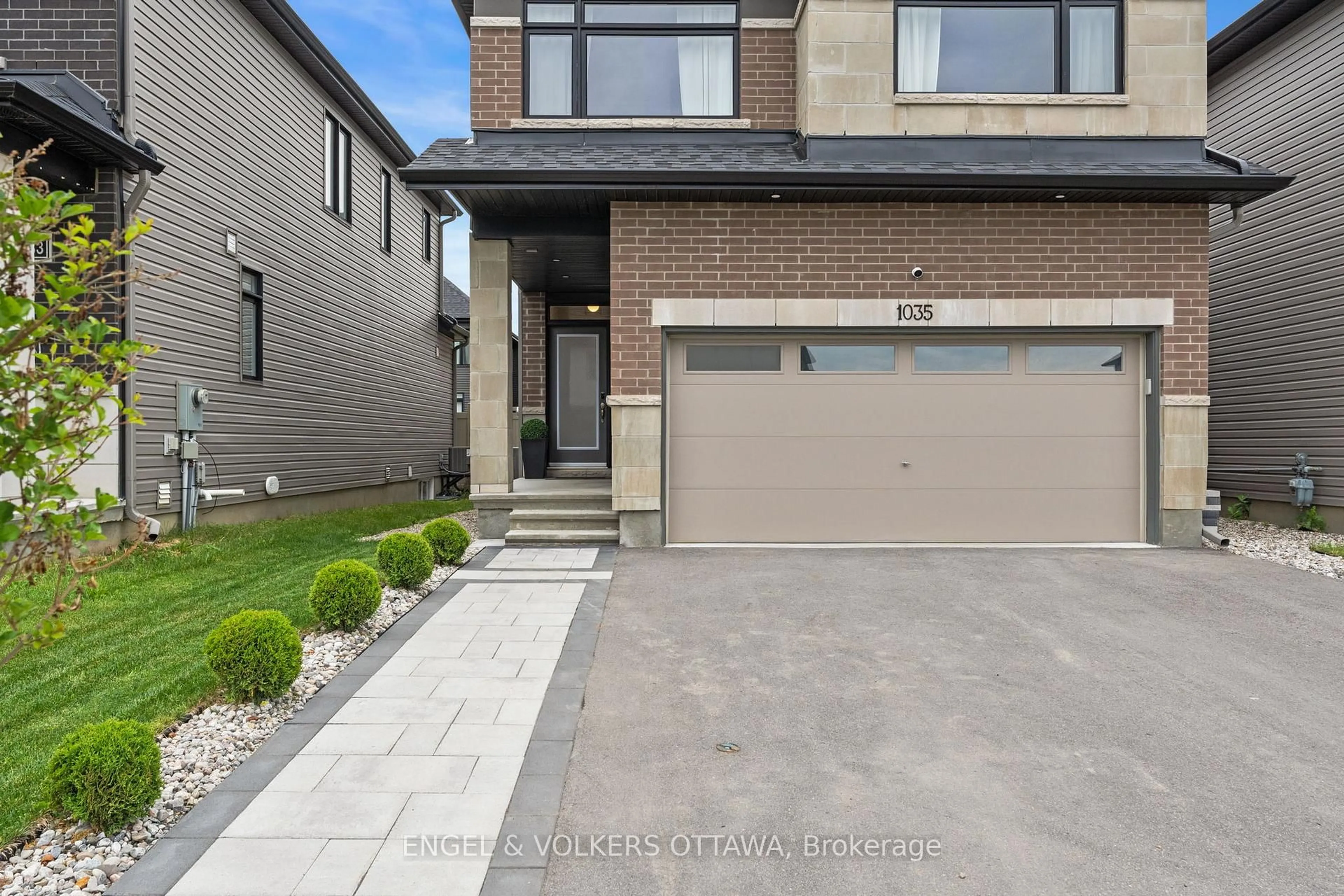 Home with brick exterior material, street for 1035 Hydrangea Ave, Manotick Ontario K4M 0L4