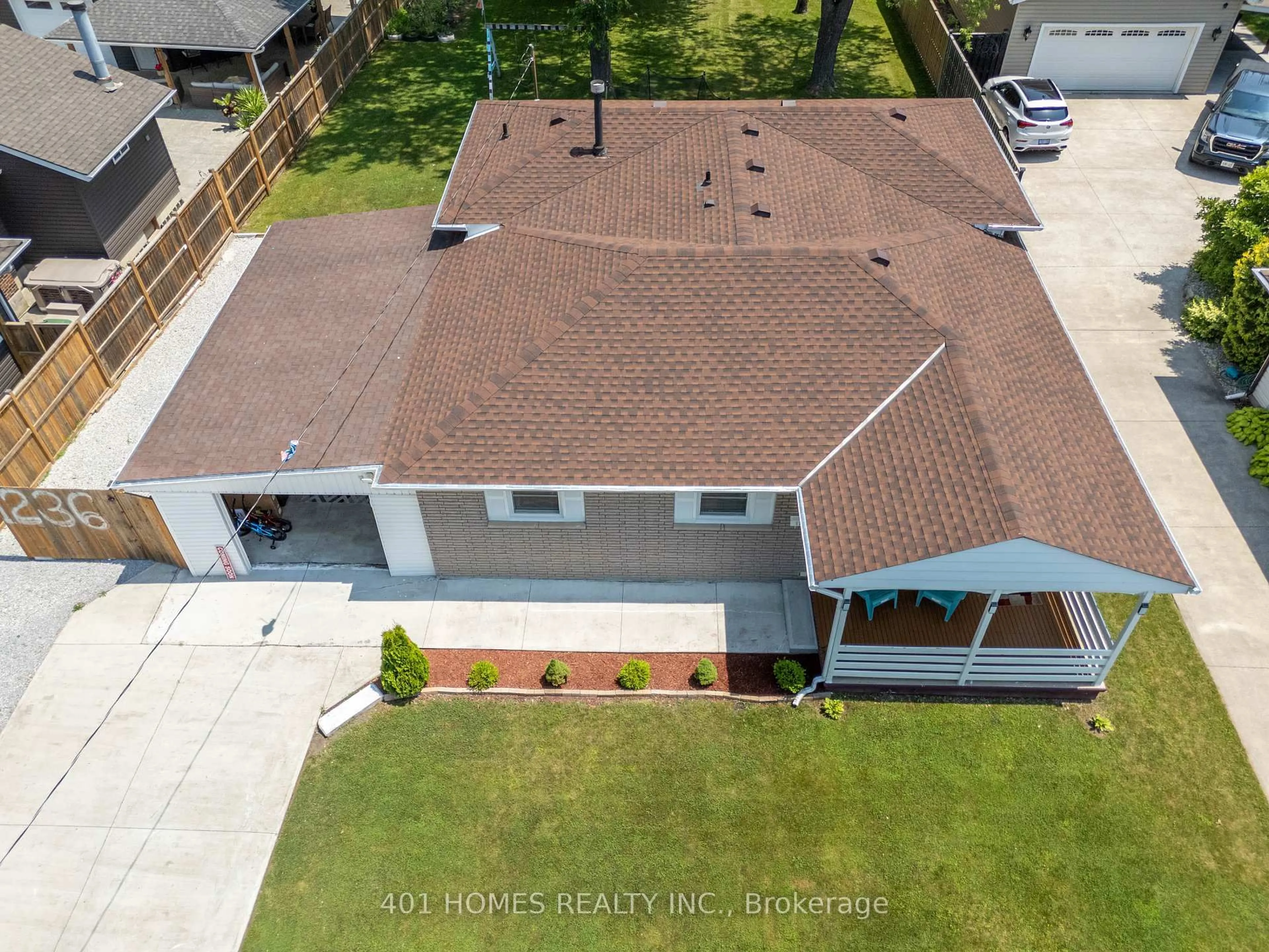 A pic from outside/outdoor area/front of a property/back of a property/a pic from drone, street for 1236 Shawnee Rd, Tecumseh Ontario N8N 1R9
