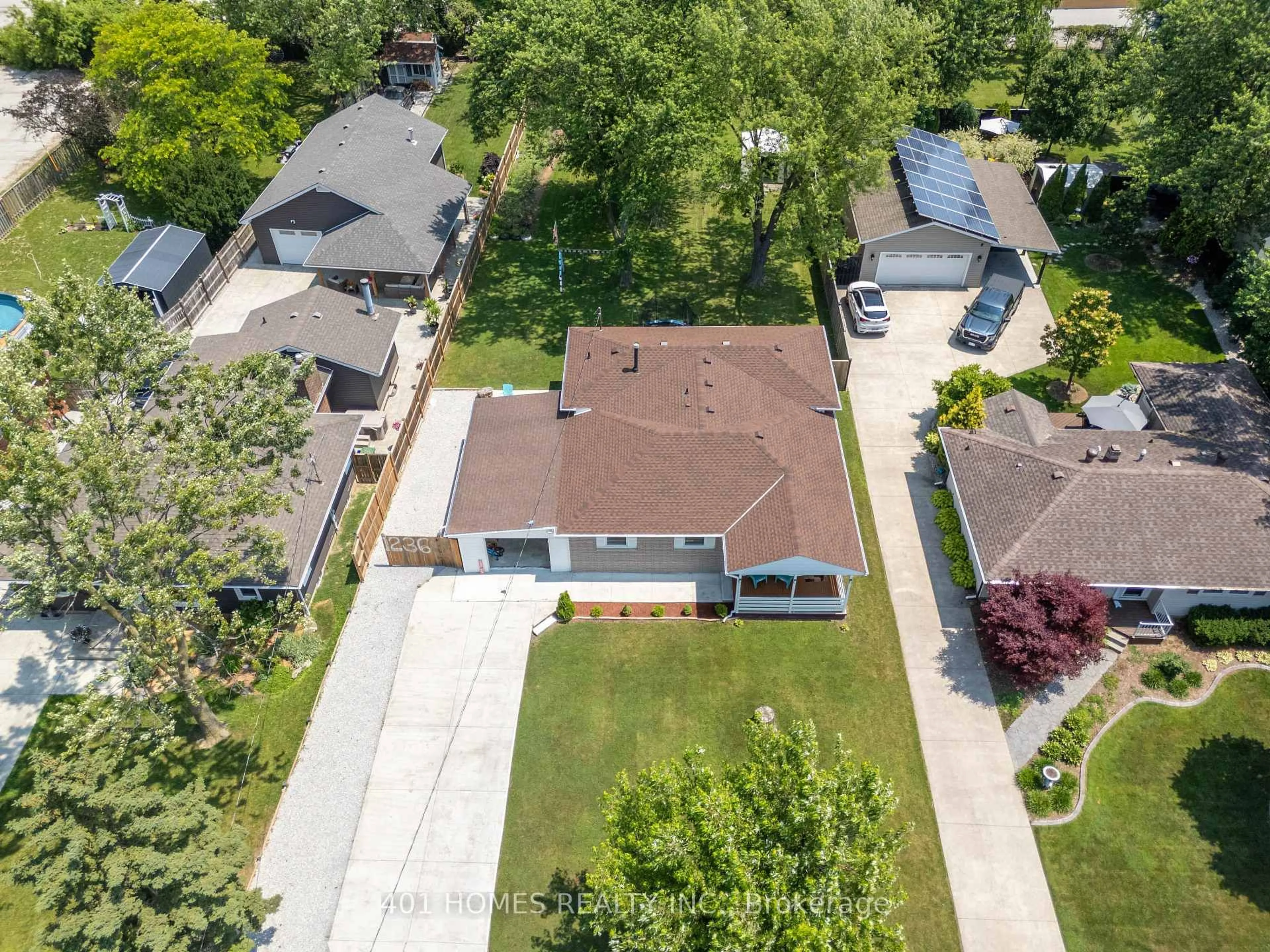 A pic from outside/outdoor area/front of a property/back of a property/a pic from drone, street for 1236 Shawnee Rd, Tecumseh Ontario N8N 1R9