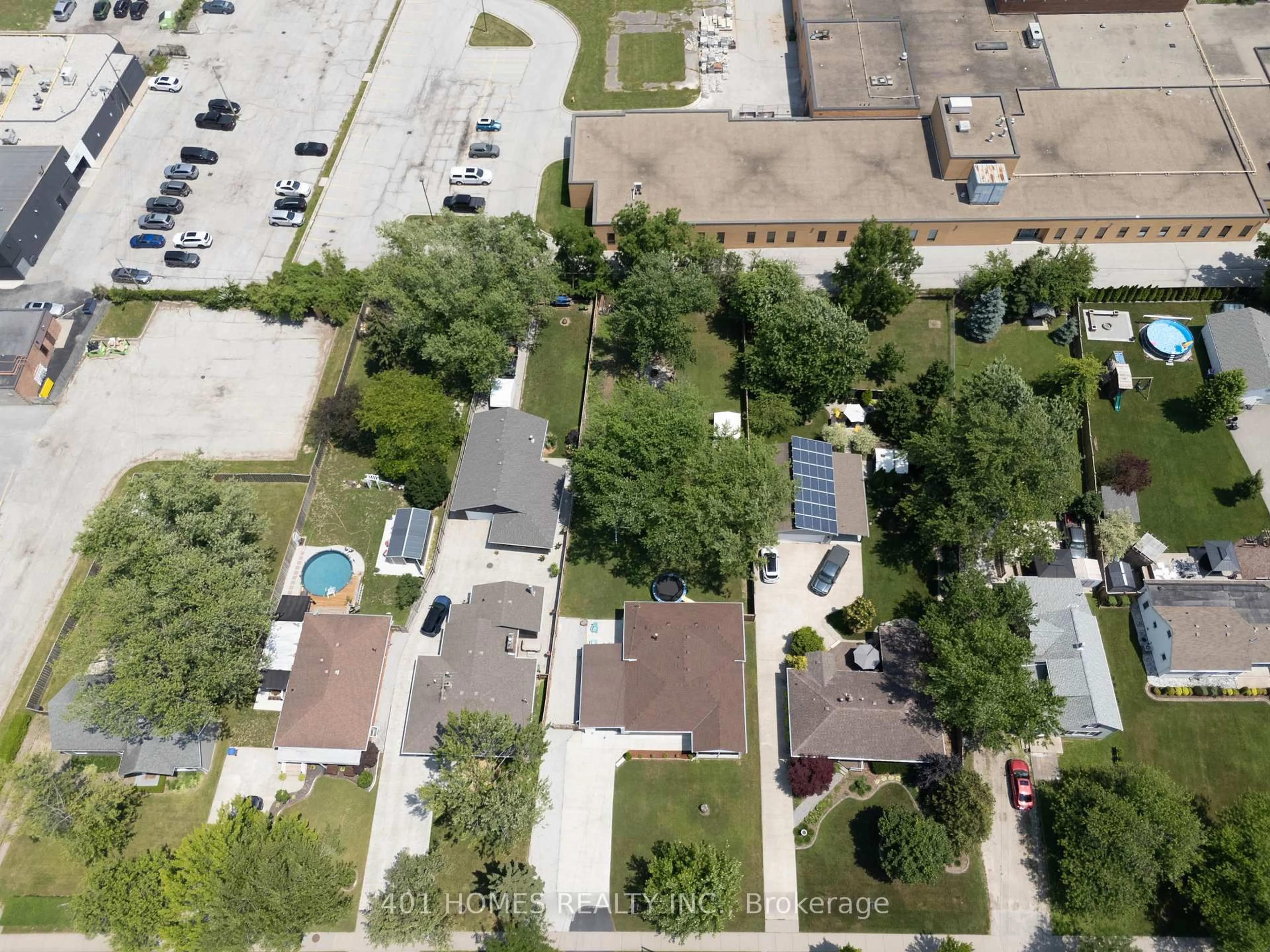 A pic from outside/outdoor area/front of a property/back of a property/a pic from drone, street for 1236 Shawnee Rd, Tecumseh Ontario N8N 1R9