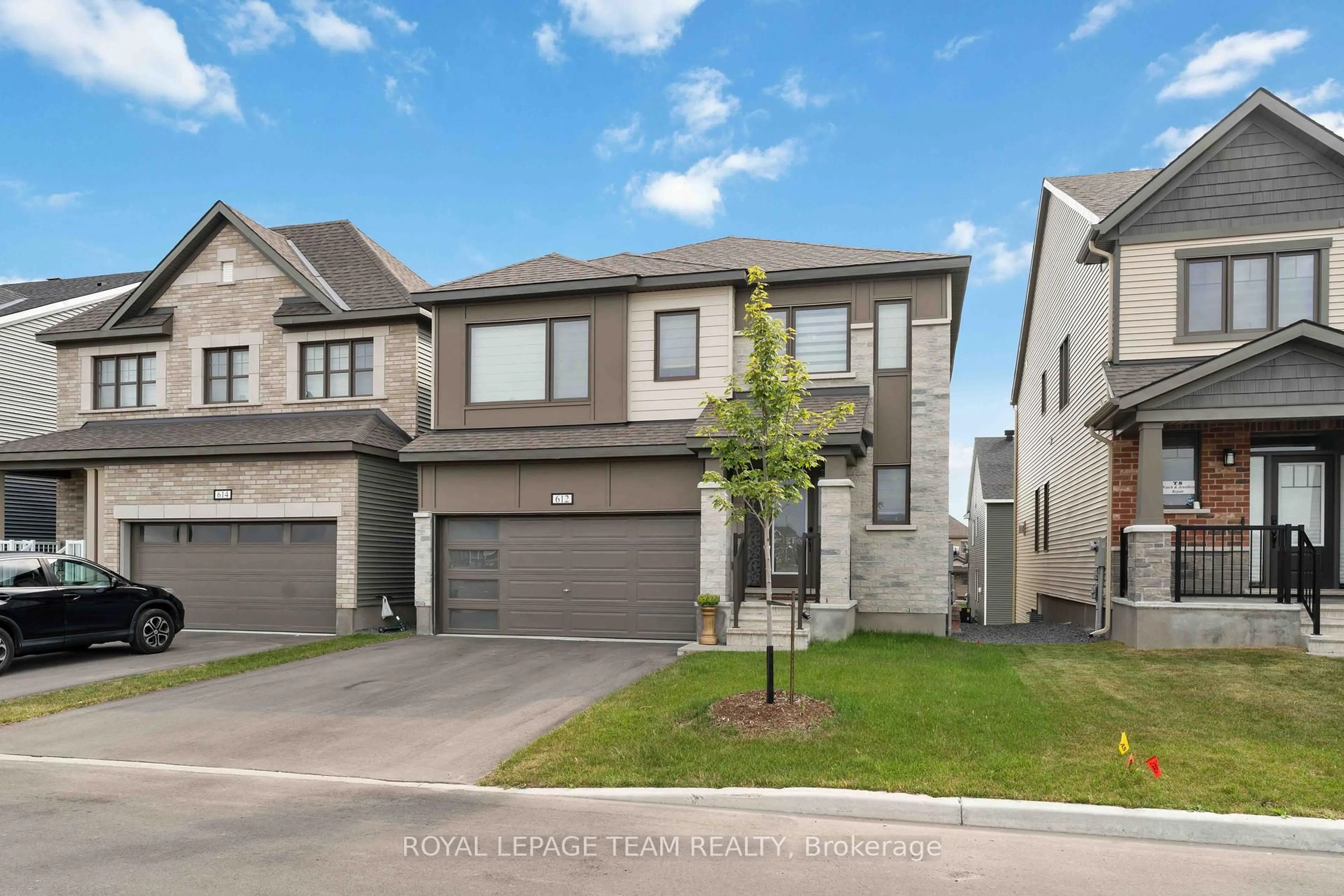 Home with brick exterior material, street for 612 RYE GRASS Way, Ottawa Ontario K2J 6Z9