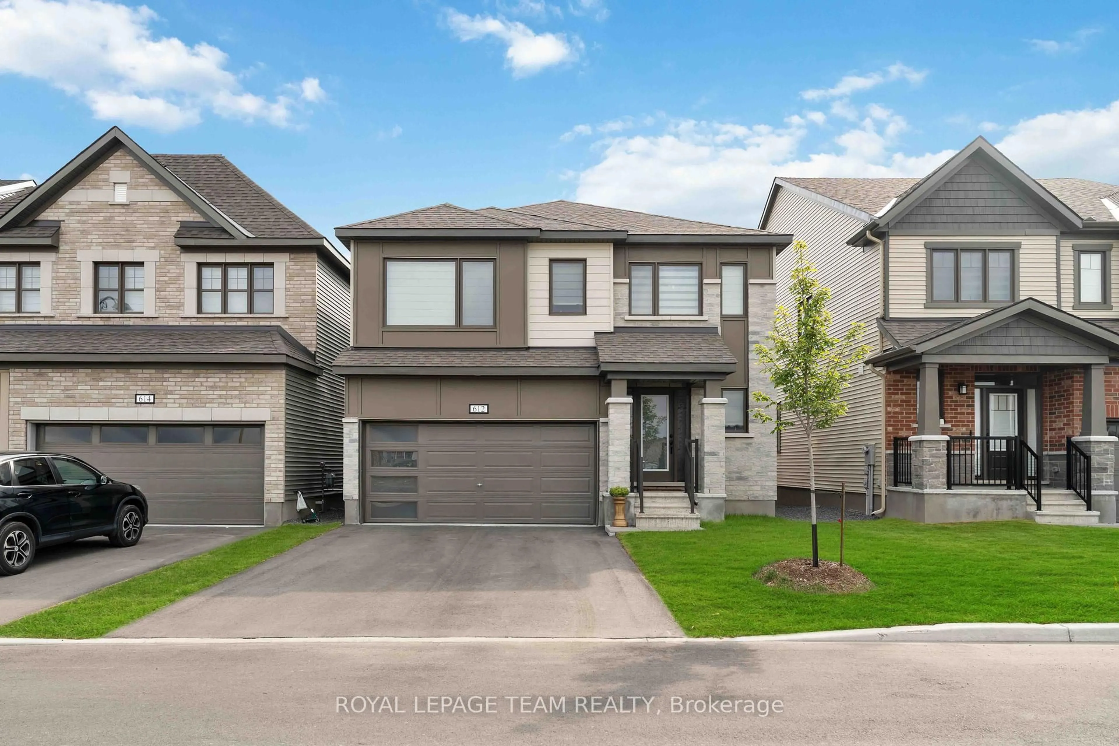 Home with brick exterior material, street for 612 RYE GRASS Way, Ottawa Ontario K2J 6Z9