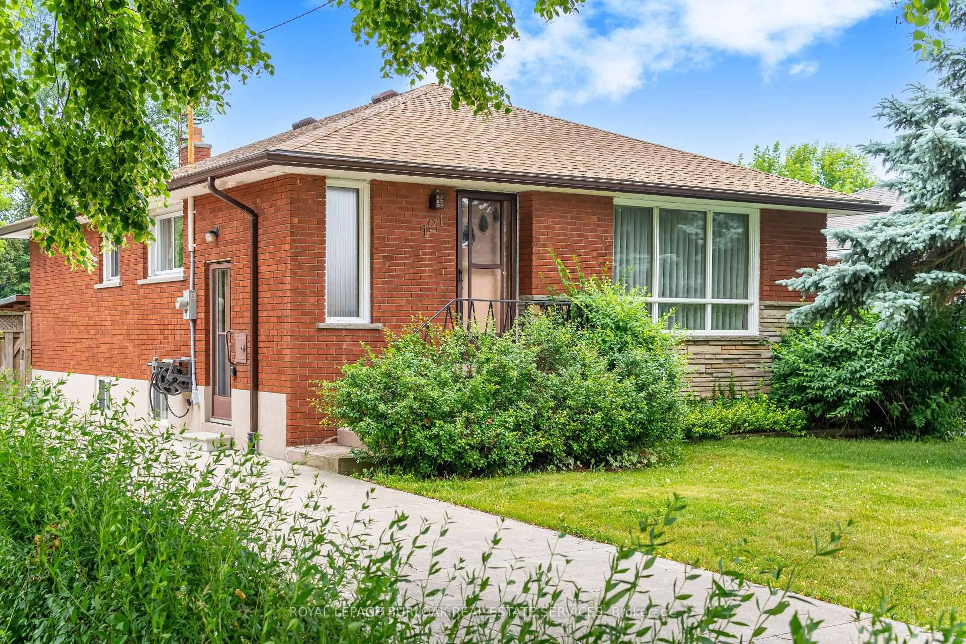 Home with brick exterior material, street for 121 Manning Ave, Hamilton Ontario L9A 3E8