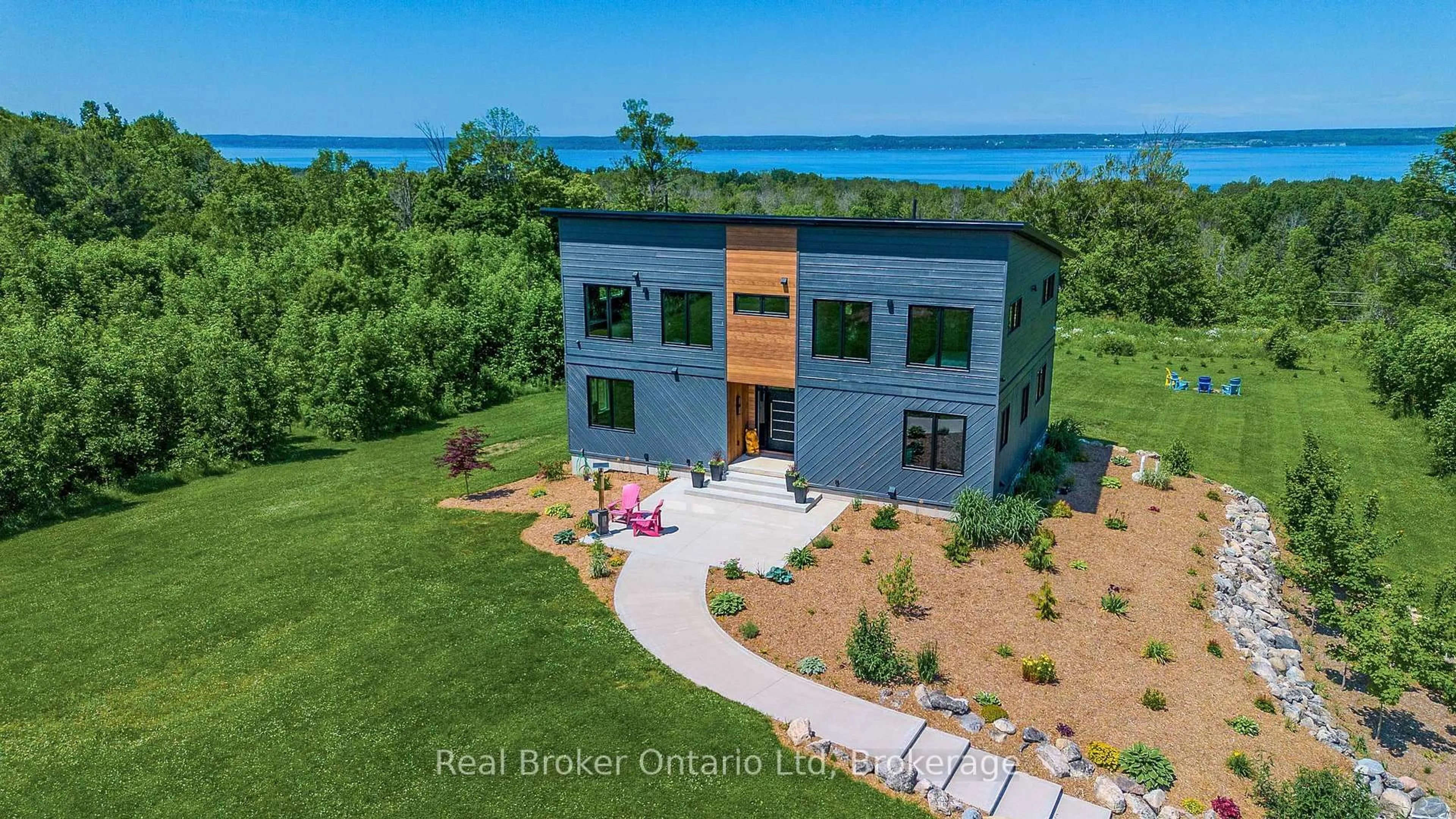 A pic from outside/outdoor area/front of a property/back of a property/a pic from drone, water/lake/river/ocean view for 359801 Bayshore Rd, Meaford Ontario N0H 1B0
