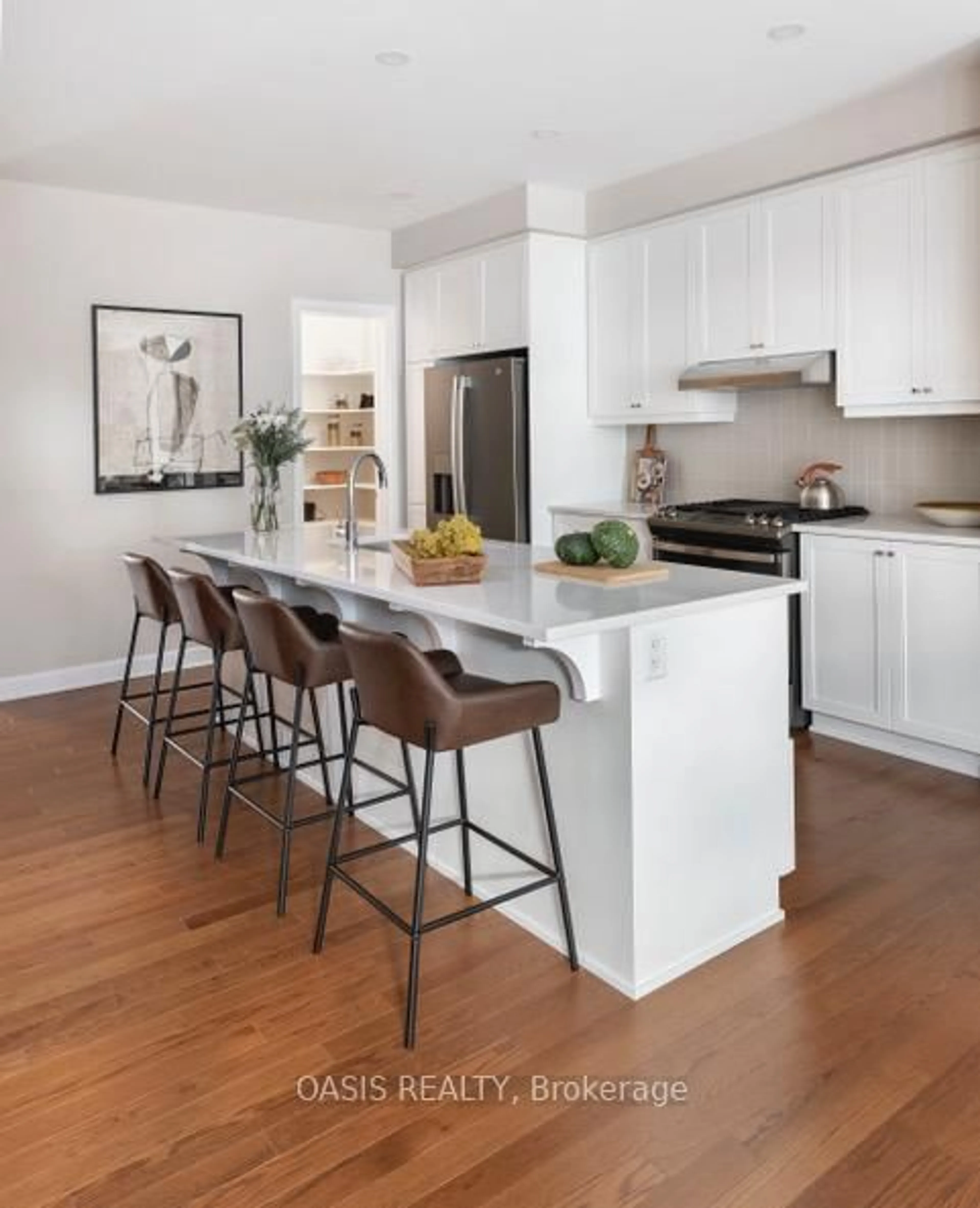 Open concept kitchen, wood/laminate floor for 137 Kerala Pl, Ottawa Ontario K1T 0Z2