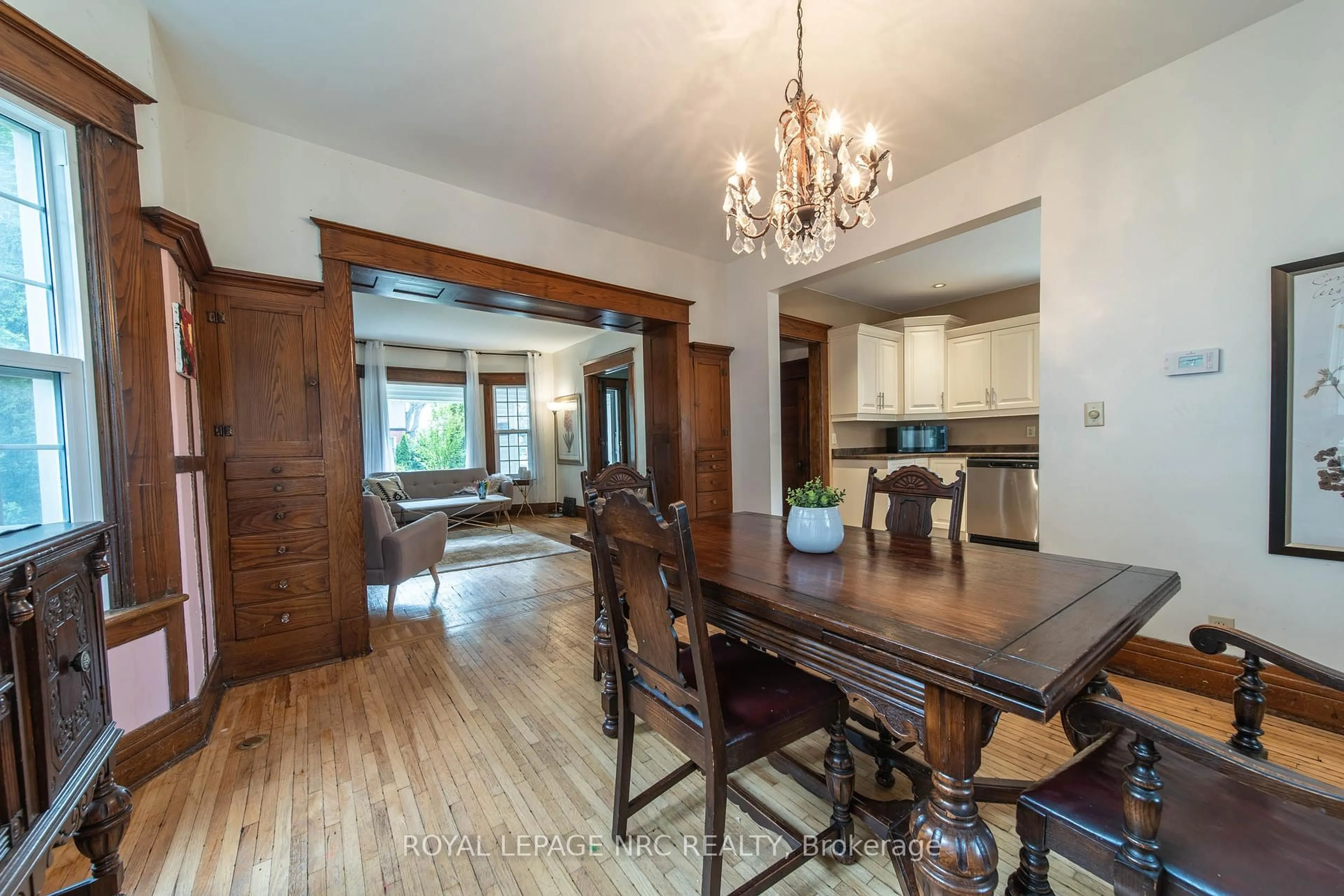 Dining room, wood/laminate floor for 6274 Pine Grove Ave, Niagara Falls Ontario L2G 4J3
