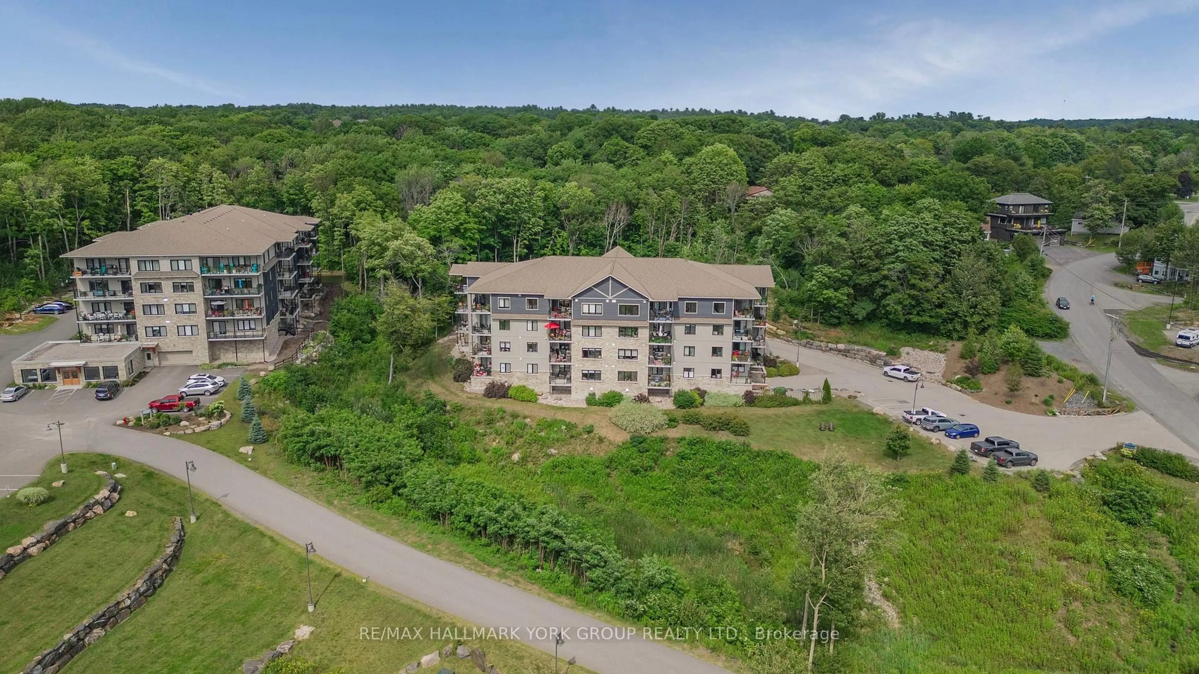 A pic from outside/outdoor area/front of a property/back of a property/a pic from drone, building for 11C Salt Dock Rd #301, Parry Sound Ontario P2A 3B6