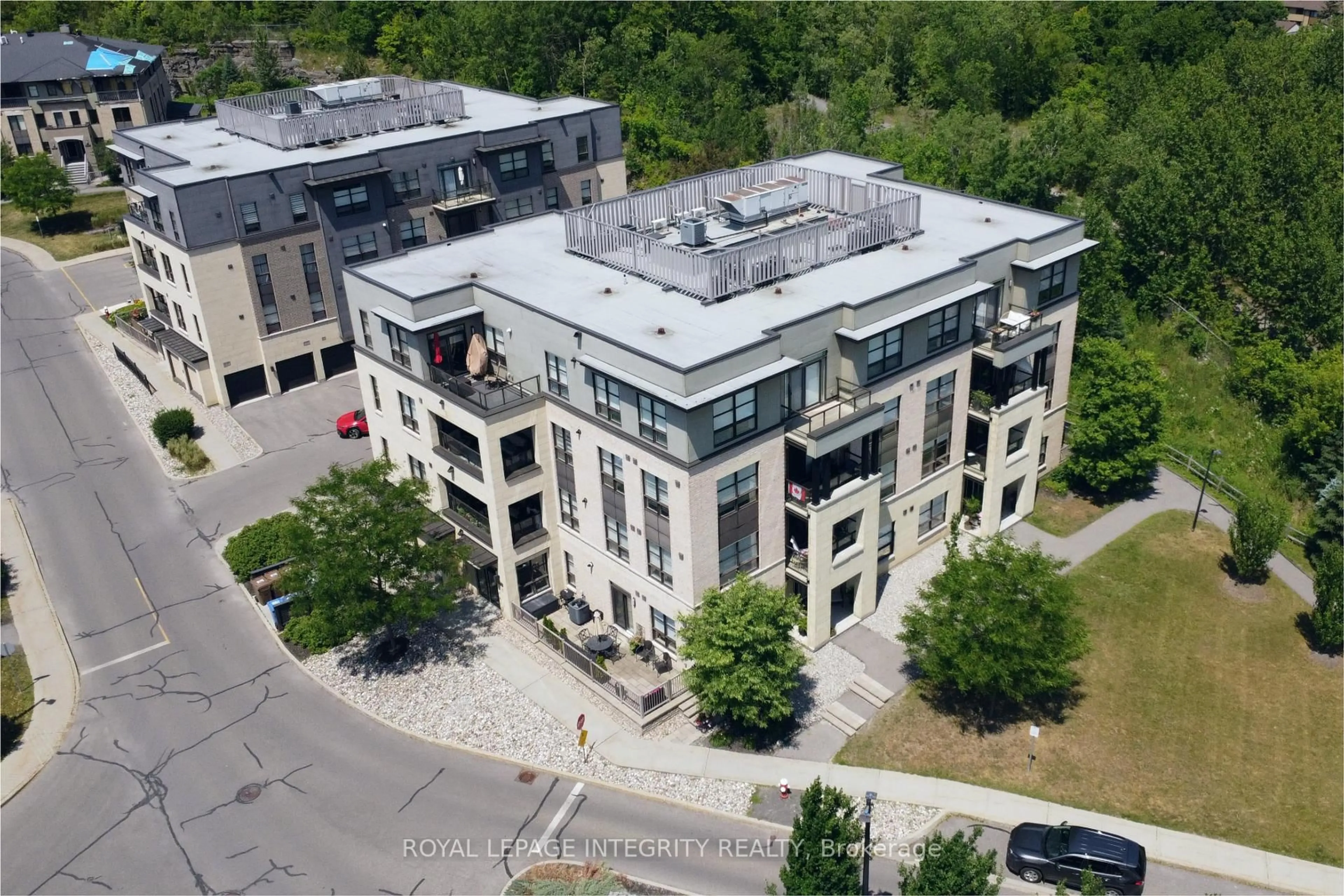 A pic from outside/outdoor area/front of a property/back of a property/a pic from drone, building for 200 Titanium Private #205, Orleans Ontario K1C 0B9