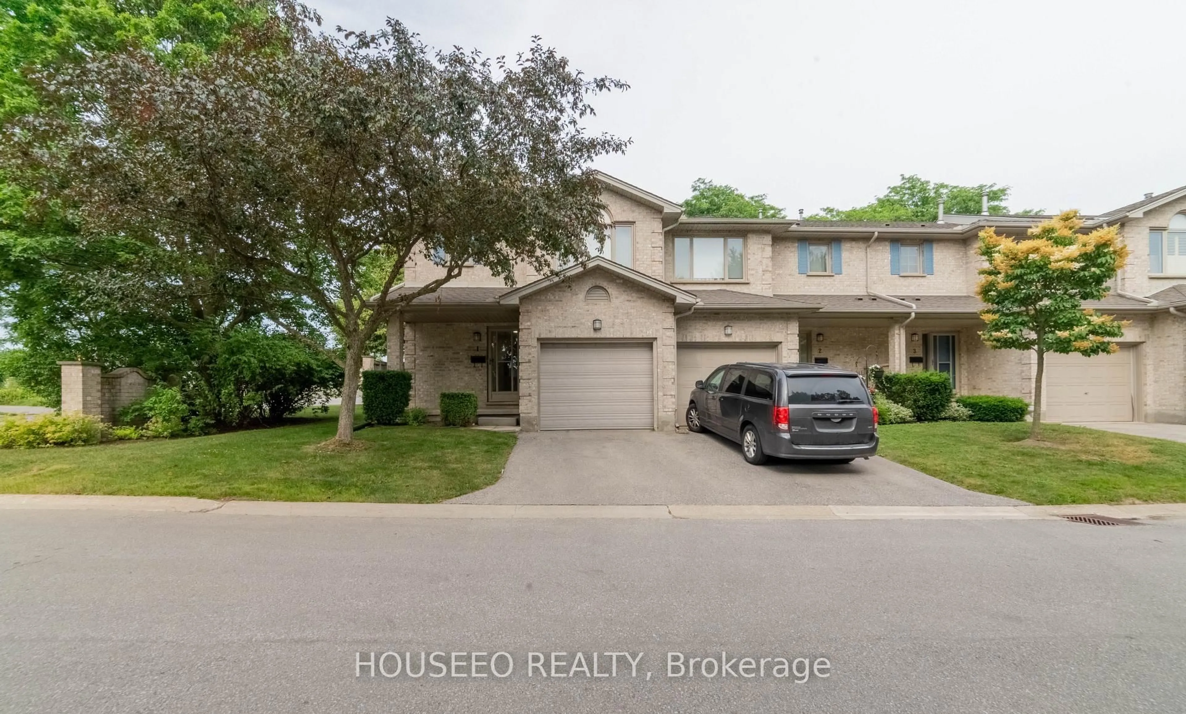 A pic from outside/outdoor area/front of a property/back of a property/a pic from drone, street for 155 Killarney Rd #1, London North Ontario N5X 3X8
