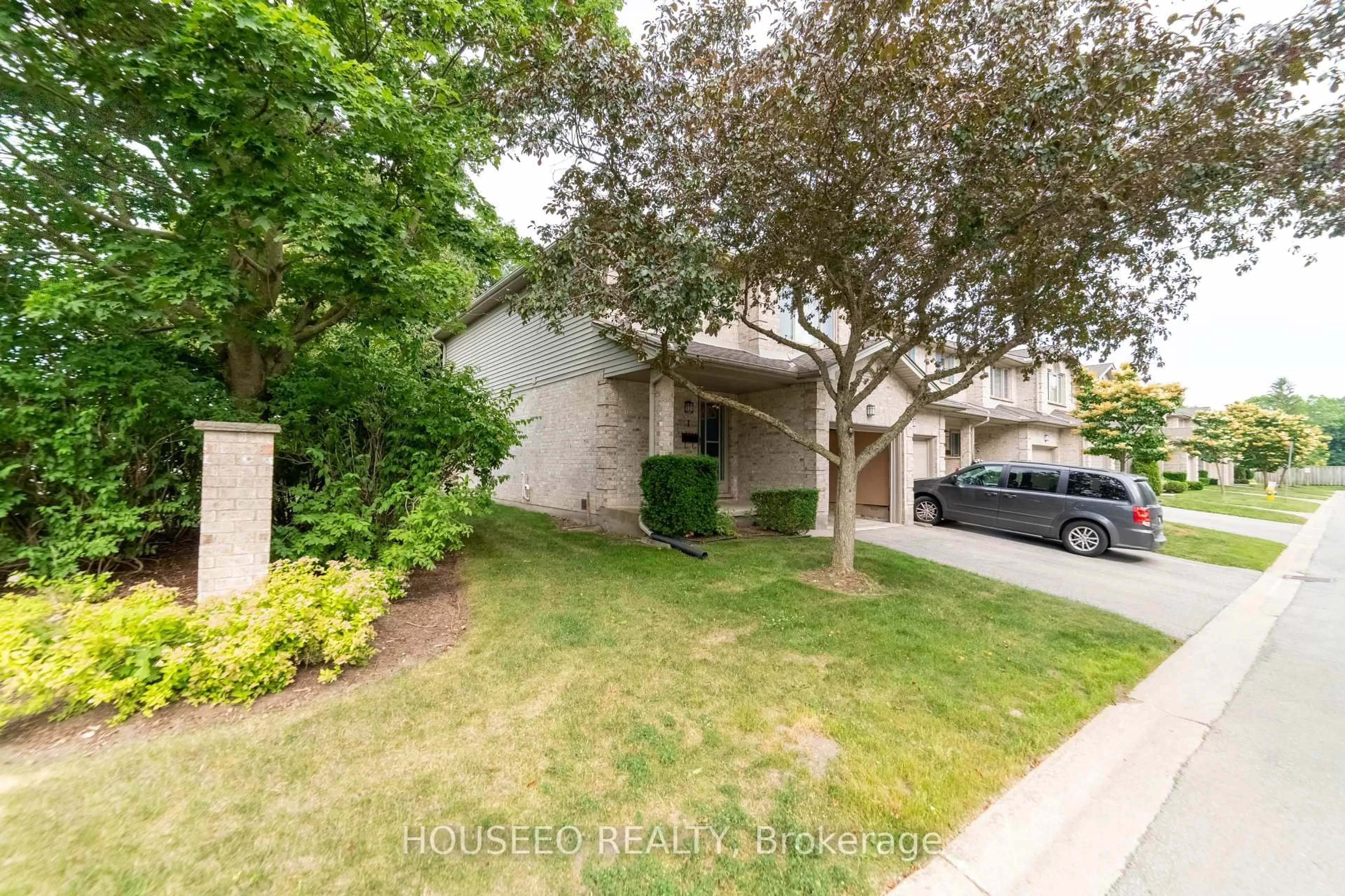 A pic from outside/outdoor area/front of a property/back of a property/a pic from drone, street for 155 Killarney Rd #1, London North Ontario N5X 3X8