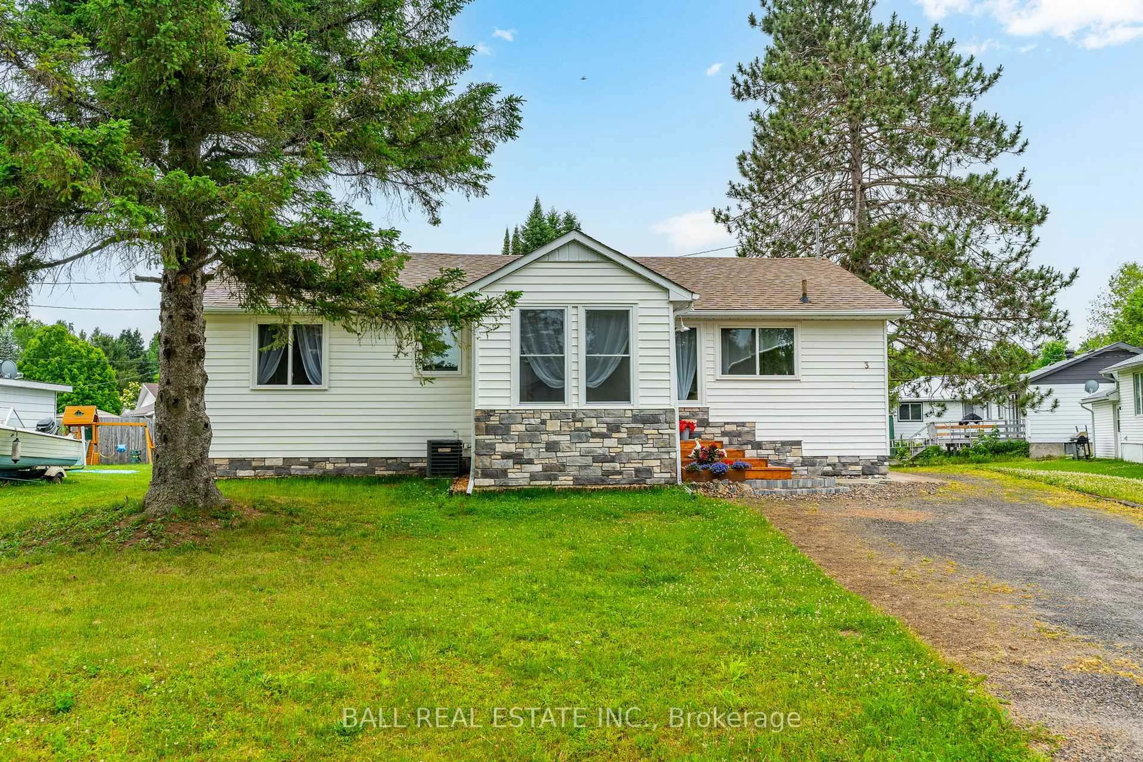 Home with vinyl exterior material, street for 3 Larch St, Highlands East Ontario K0L 1M0