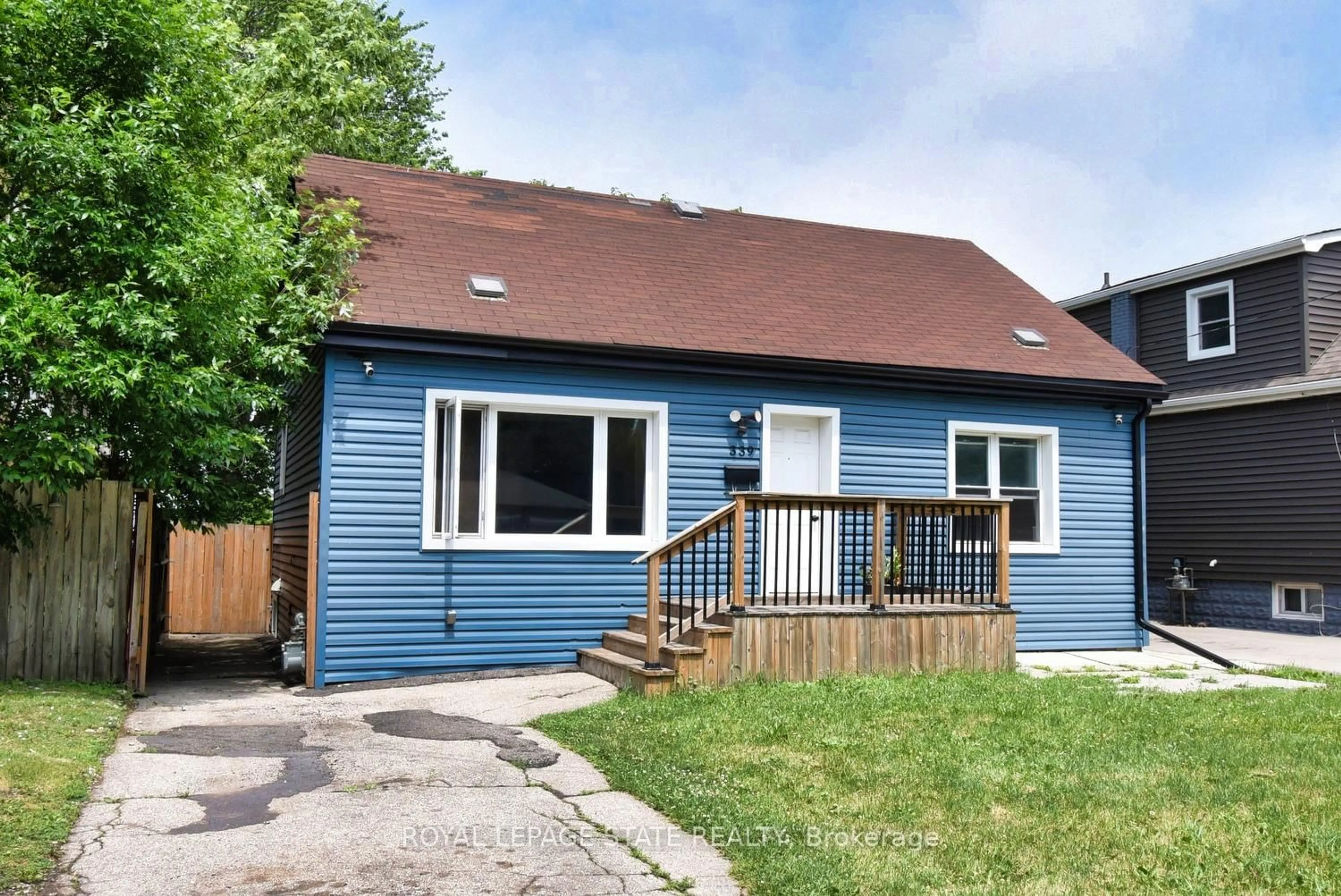 Home with vinyl exterior material, street for 339 Melvin Ave, Hamilton Ontario L8H 2K6