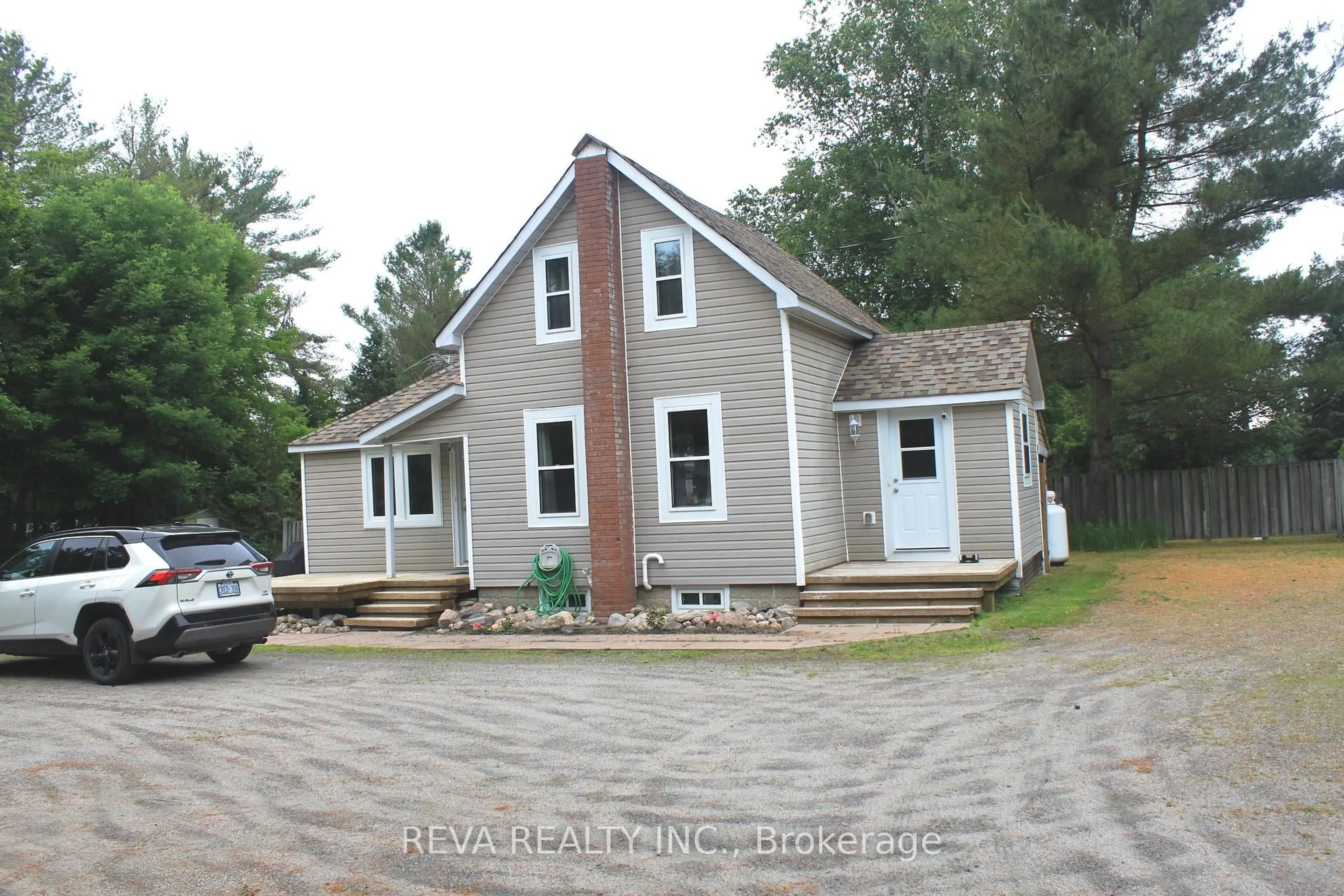 A pic from outside/outdoor area/front of a property/back of a property/a pic from drone, street for 15615 Hwy 35 Highway, Algonquin Highlands Ontario K0M 1J2
