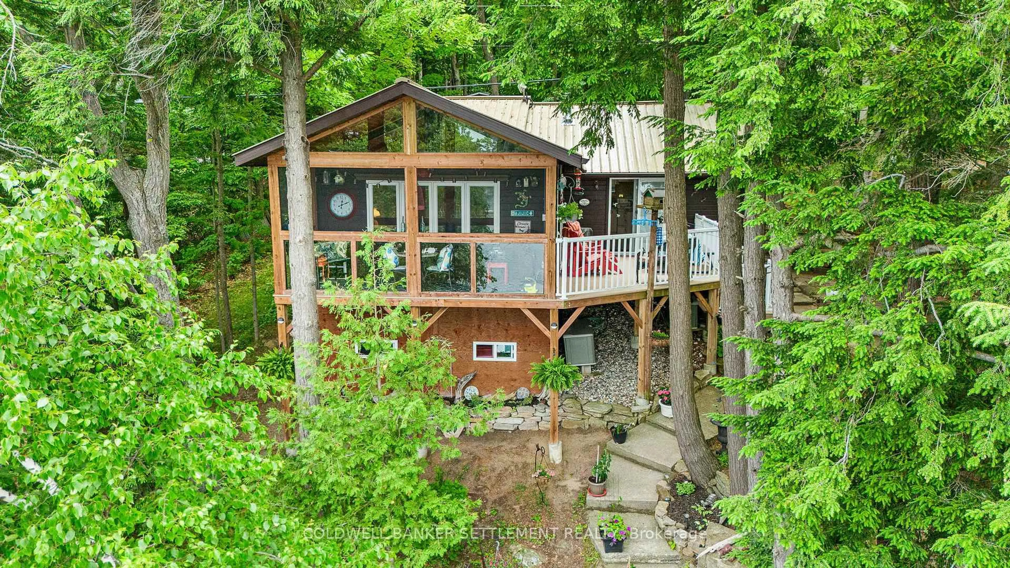 A pic from outside/outdoor area/front of a property/back of a property/a pic from drone, unknown for 141 Christie Lake Lane 32 Lane, Perth Ontario K7H 3C6