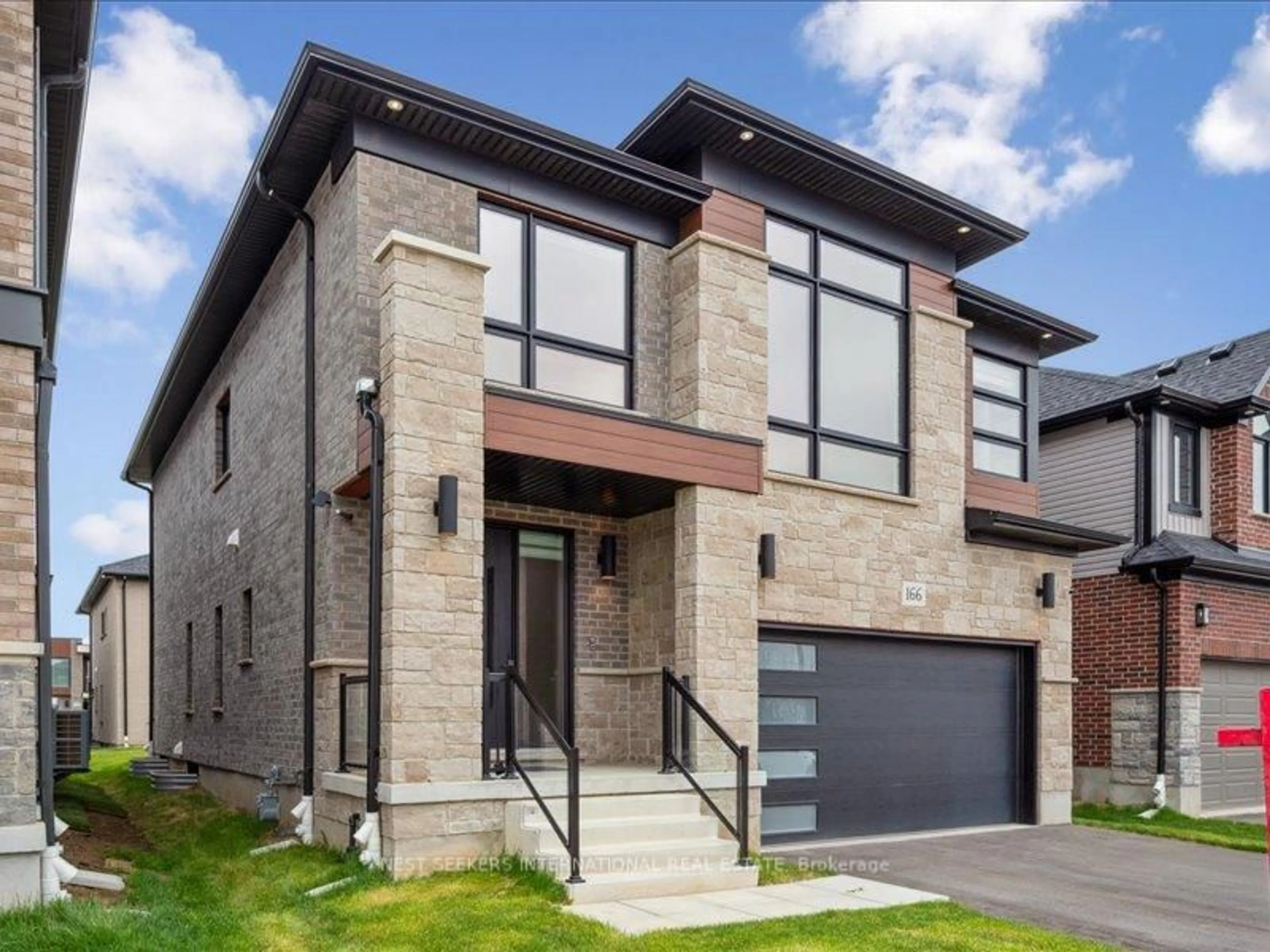 Home with brick exterior material, street for 166 Shaded Creek Dr, Kitchener Ontario N2P 0K7