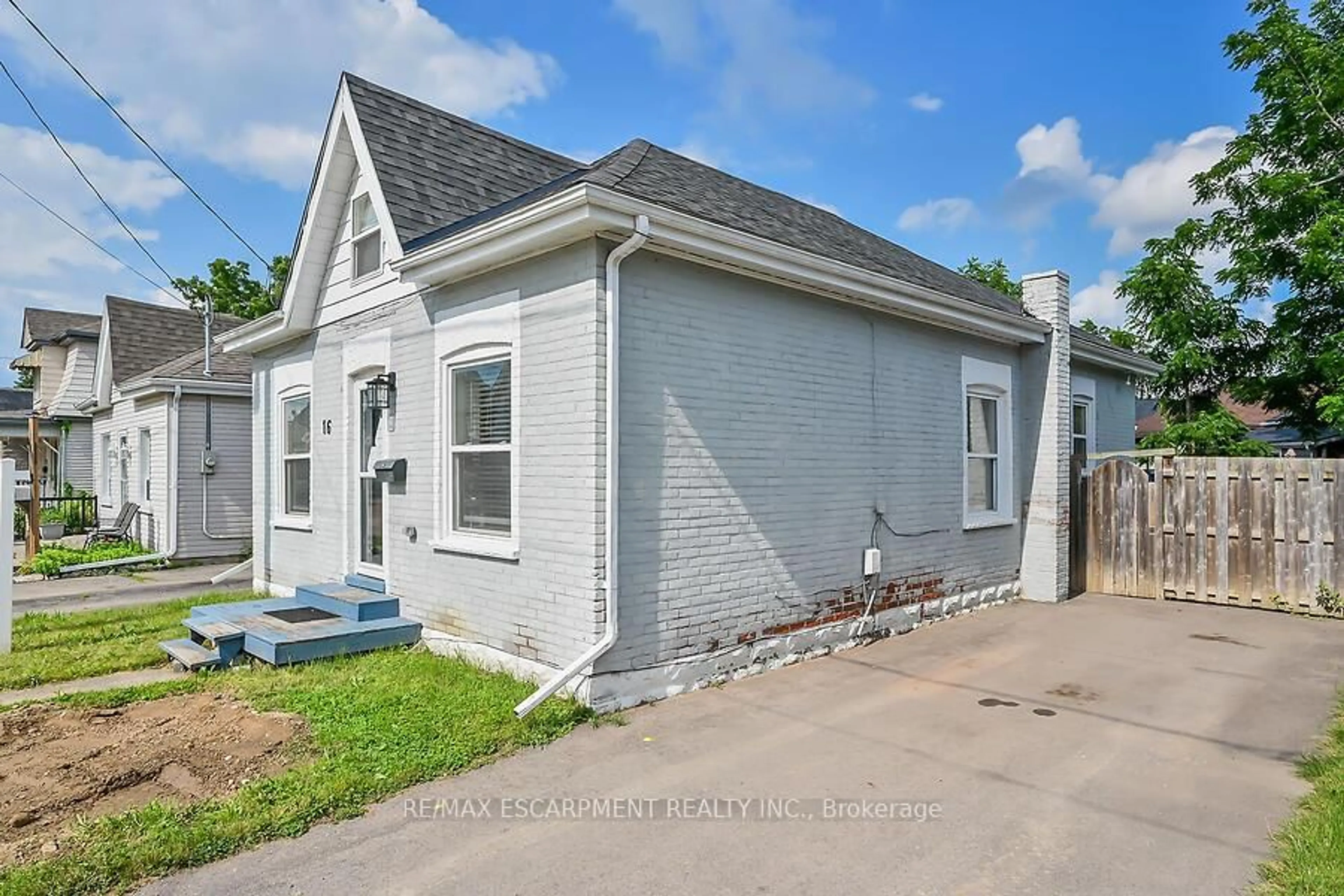 Home with brick exterior material, street for 16 Webling St, Brantford Ontario N3S 2S7